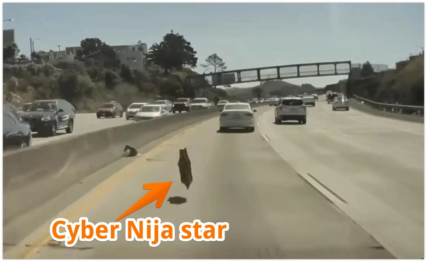 Watch A Tesla Cybertruck's Wheel Cover Whiff Off And Go Airborne On The Highway 2023-11-28 14-...jpg