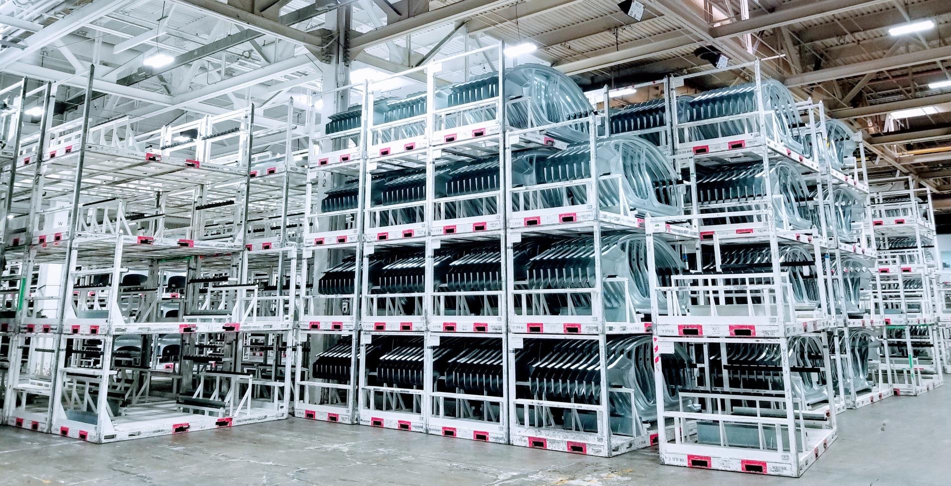 Tesla Cybertruck Elon Musk: “Tesla’s Long-Term Competitive Advantage Will Be Manufacturing” tesla-fremont-factory-body-parts-press-storage