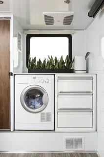 Tesla Cybertruck These Off-Grid, Luxury Travel Trailers Pack Enough Oomph to Power a Tesla Cybertruck unit-can-be-added-next-to-the-three-drawer-dresser