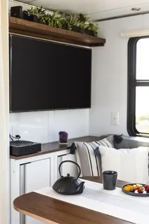 Tesla Cybertruck These Off-Grid, Luxury Travel Trailers Pack Enough Oomph to Power a Tesla Cybertruck ce-has-also-been-upgraded-with-a-new-media-cabinet