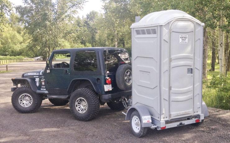 Tesla Cybertruck Cybertruck Towing during cross-country trek porta potty