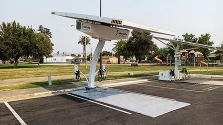 Tesla Cybertruck SparkCharge Introduces ‘The Roadie’ Portable EV Charging System electrify-america-s-beam-ev-arc-solar-canopy
