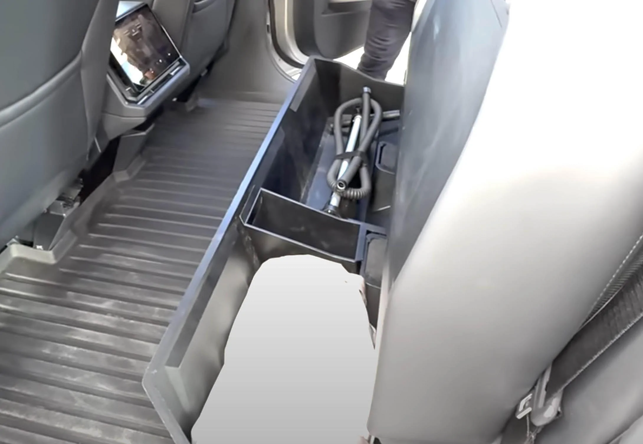 Tesla Cybertruck Storage boxes accessory below 2nd row seat when folded up Underseat storage compartment rear seats folded u