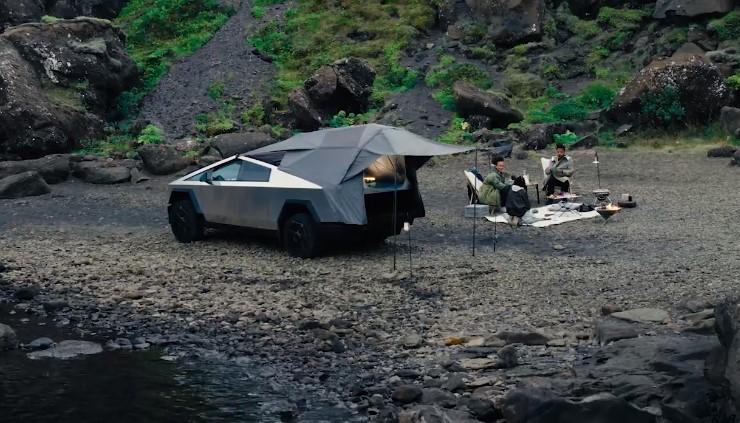Tesla Cybertruck Anyone notice what looks like self leveling in the Tesla promo? Tent 1