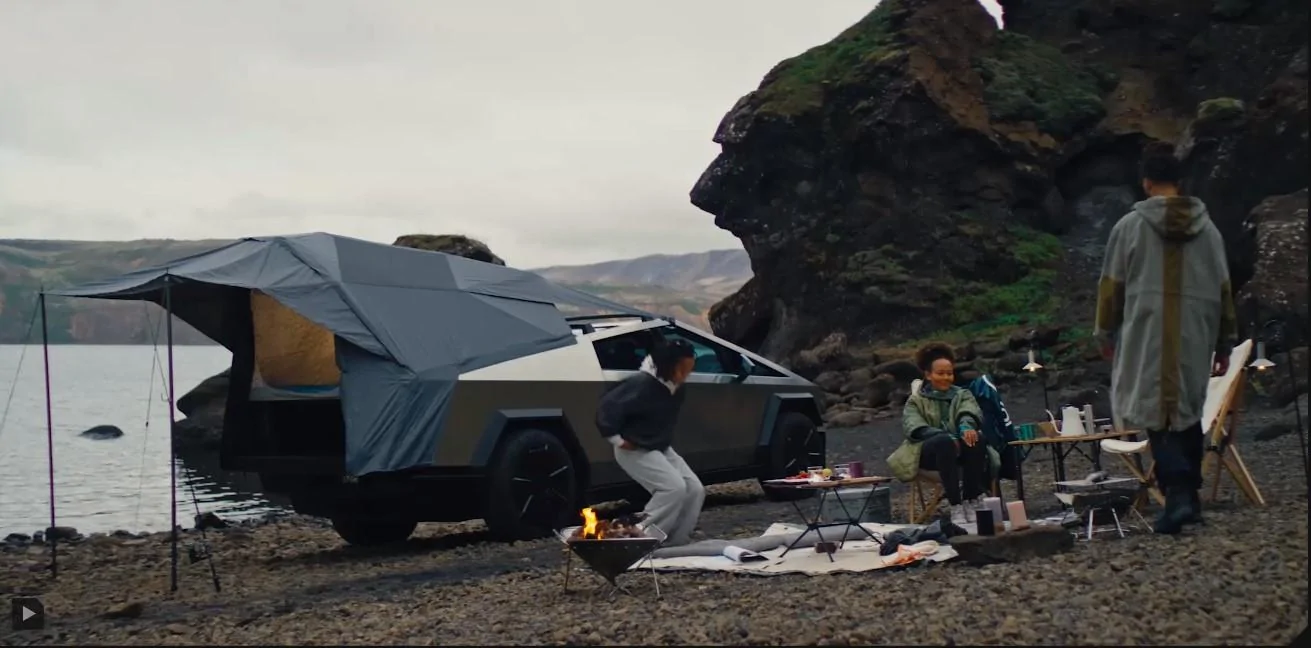 Tesla Cybertruck Anyone notice what looks like self leveling in the Tesla promo? Tent 2