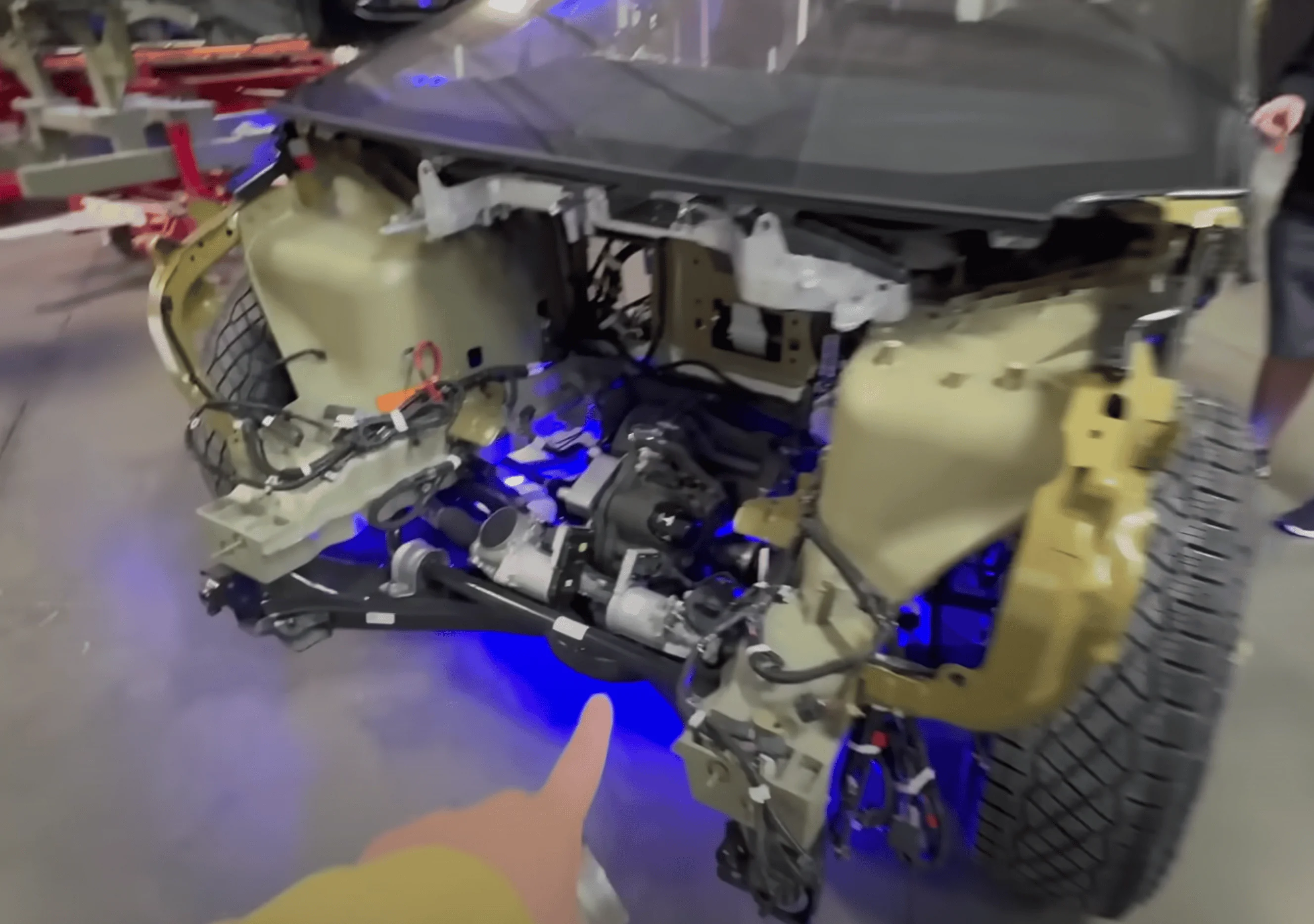Tesla Cybertruck Out of Spec's factory tour video shows lots of Cybertruck details under the hood Frunk Space2