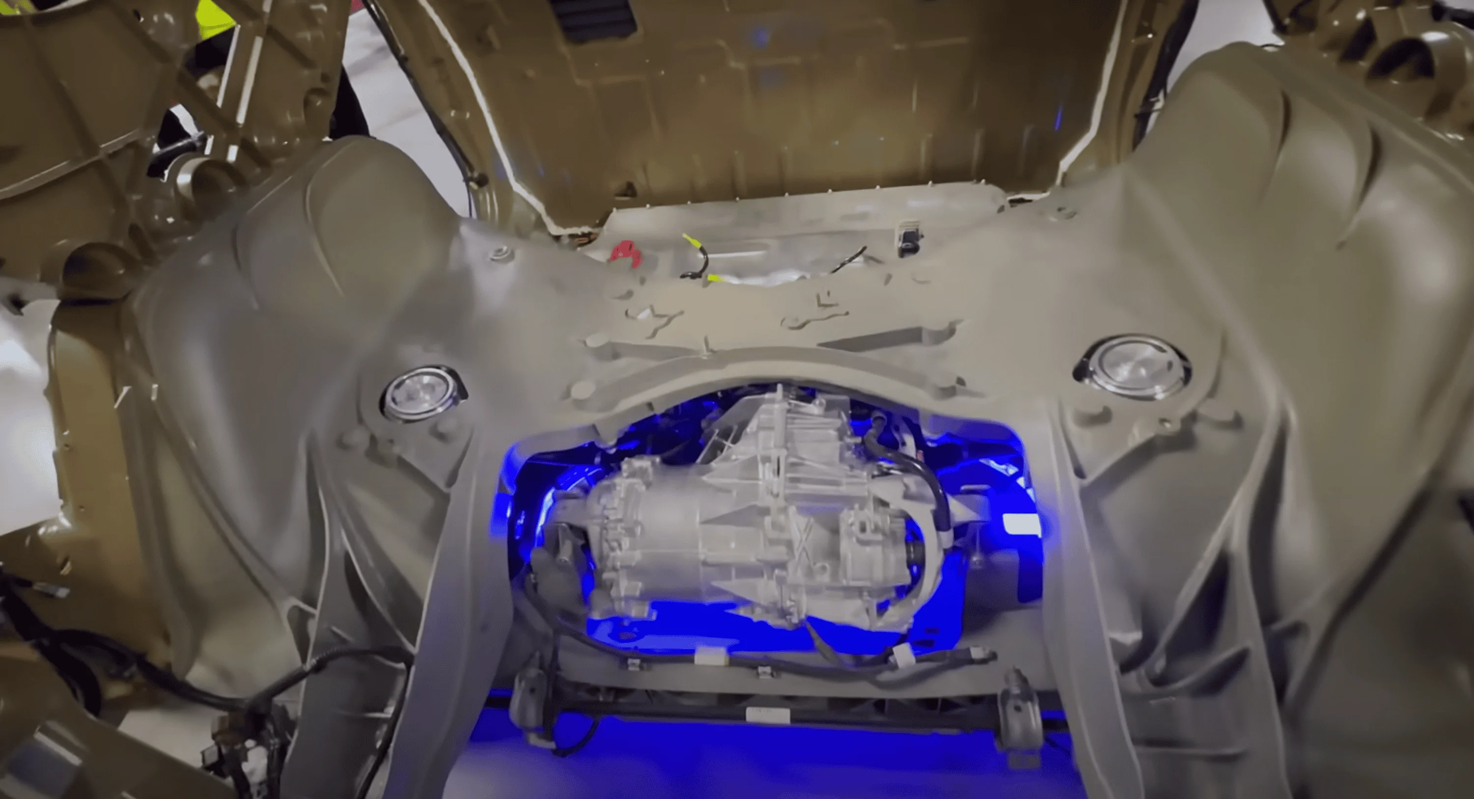 Tesla Cybertruck Out of Spec's factory tour video shows lots of Cybertruck details under the hood CT Rear Cast with DM PM motor
