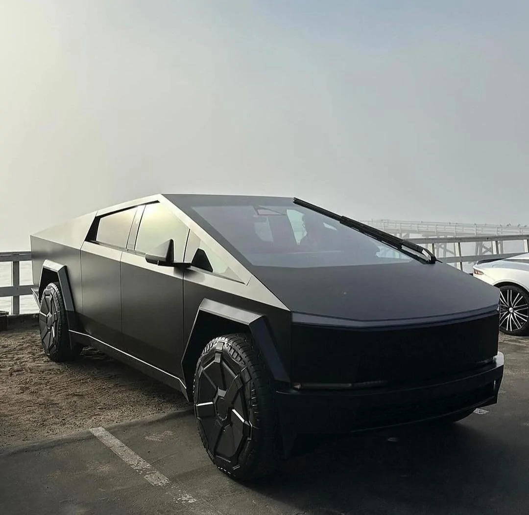 Tesla Cybertruck Cybertruck factory color wrap in WHITE or BLACK will cost $6,500. Satin stealth clear wrap costs $5K 1000004683
