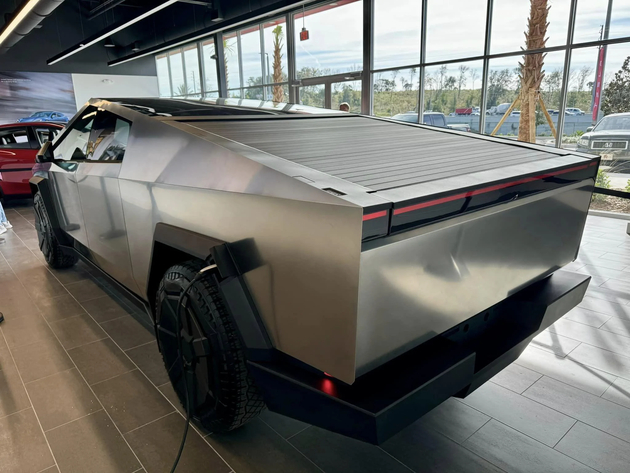 Tesla Cybertruck A Cybertruck appears at just-opened Clermont Florida Tesla Store / Service Center! 672118_10230402819750318_6479689347879293291_n-jpg