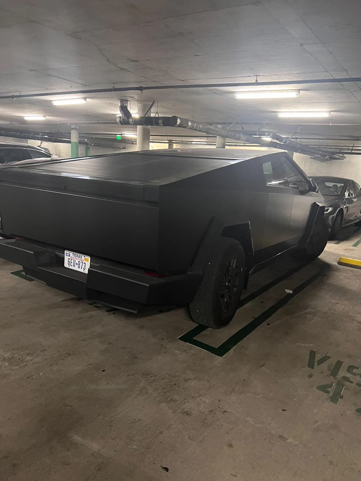 Tesla Cybertruck Matte Black Cybertruck Finally Appears!! 😱 Driven by Franz Von Holzhausen GBGMAlAaoAEJ9u