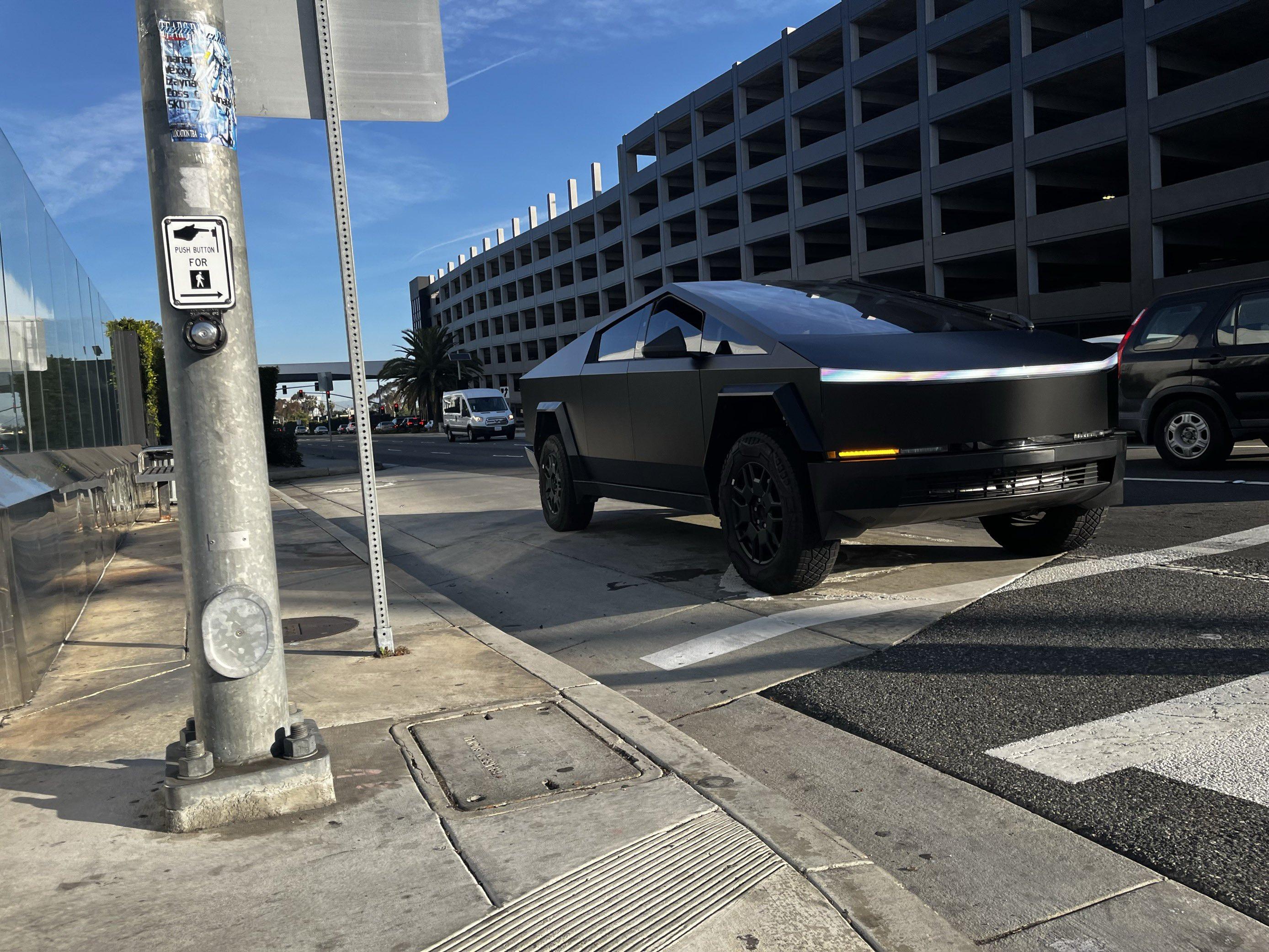 Tesla Cybertruck 🤳 Random Cybertruck sightings & spottings thread (pics + videos) tesla cybertruck matte black wrap 1