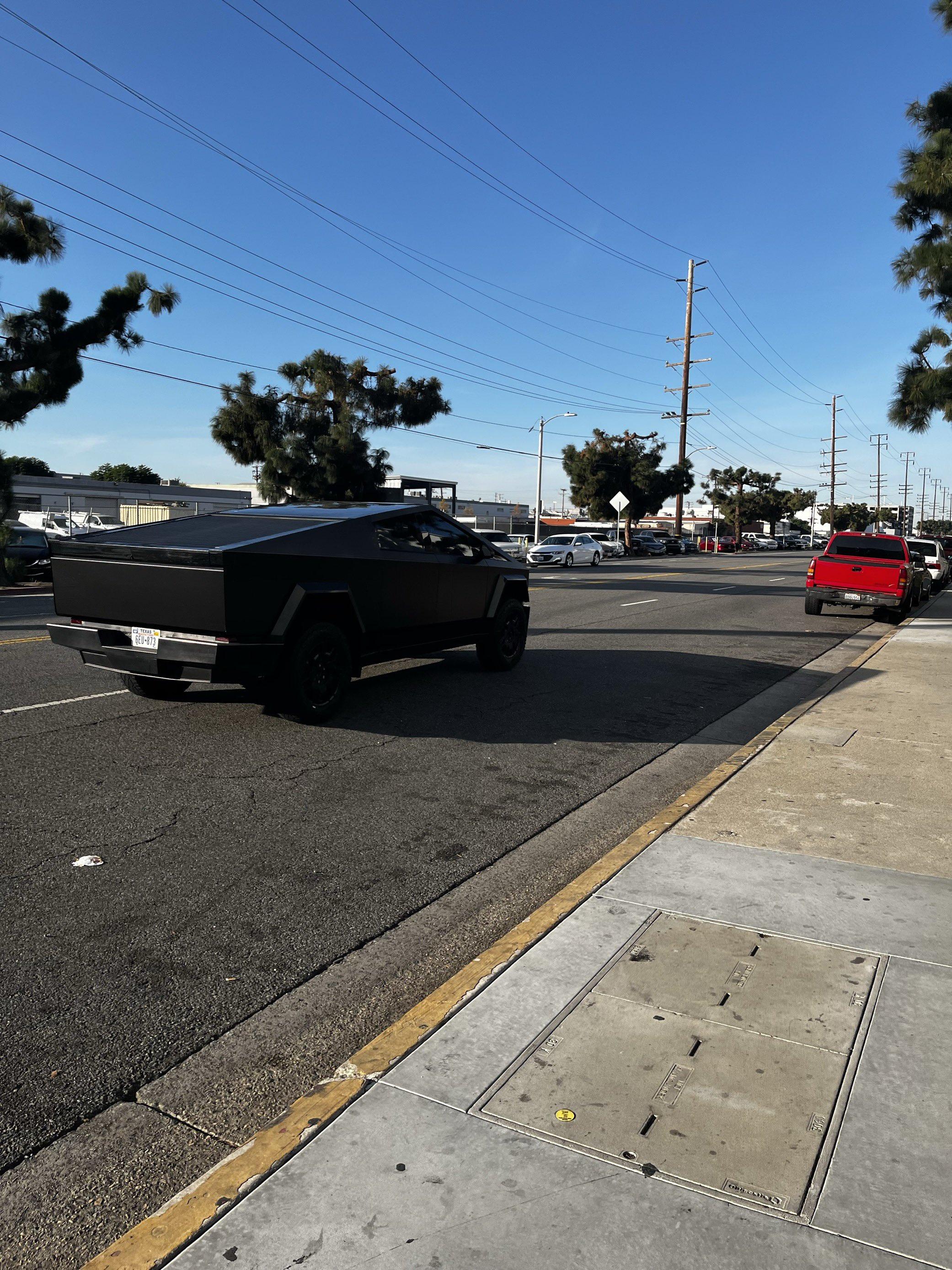 Tesla Cybertruck 🤳 Random Cybertruck sightings & spottings thread (pics + videos) tesla cybertruck matte black wrap 3