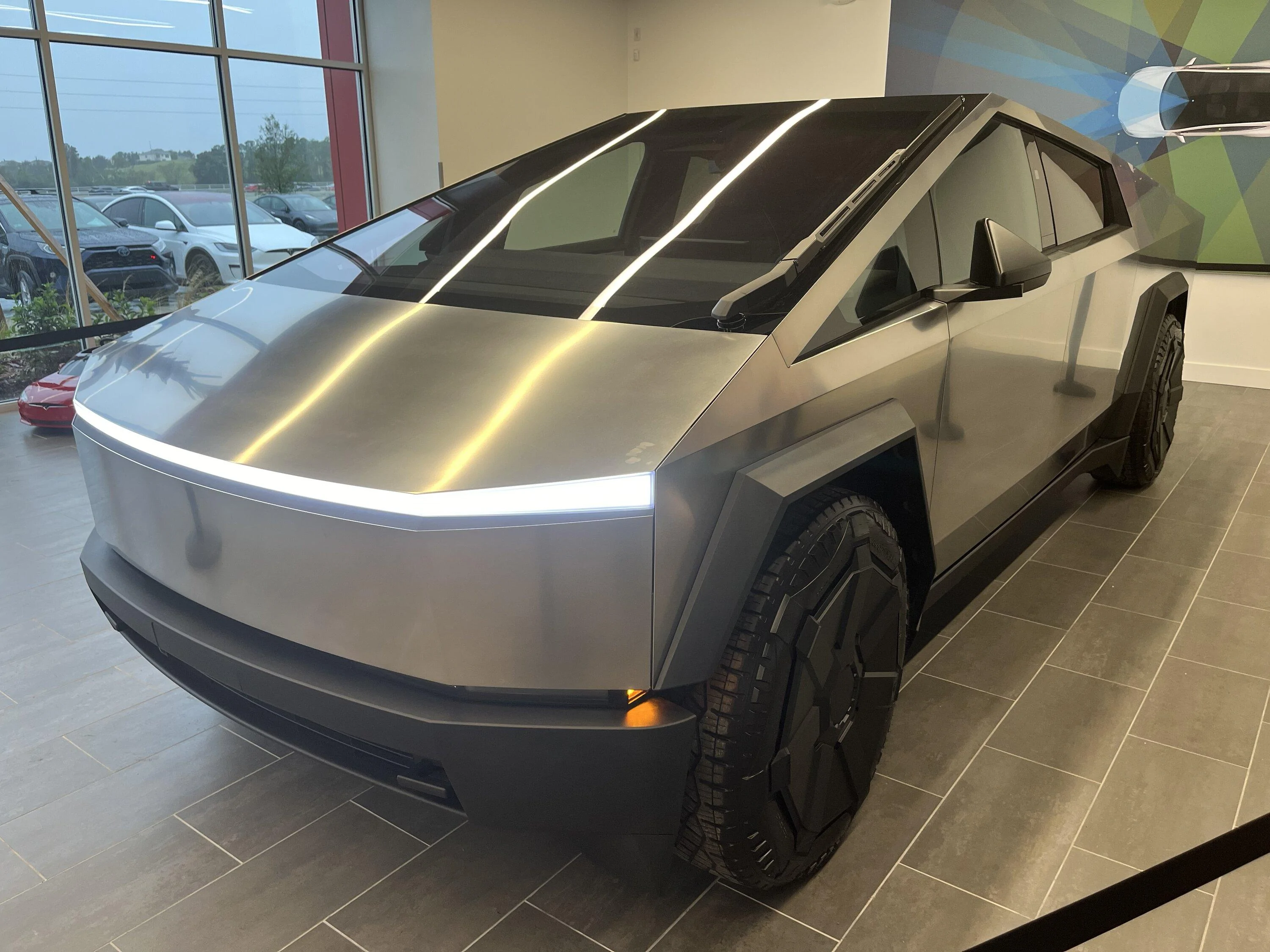 Tesla Cybertruck My pics from seeing Cybertruck in Orlando showroom. Will be trading my S for one IMG_2290