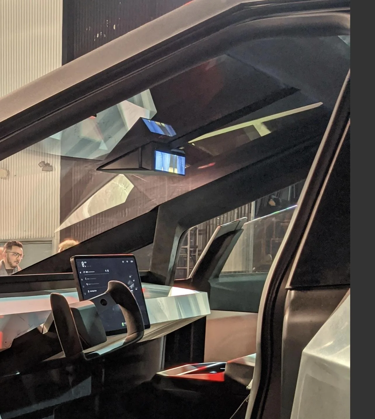 Tesla Cybertruck Cybertruck with LED light bar and in high suspension mode spotted at charging station D6B9B649-3F37-4E19-990F-081BC3A4BC0C