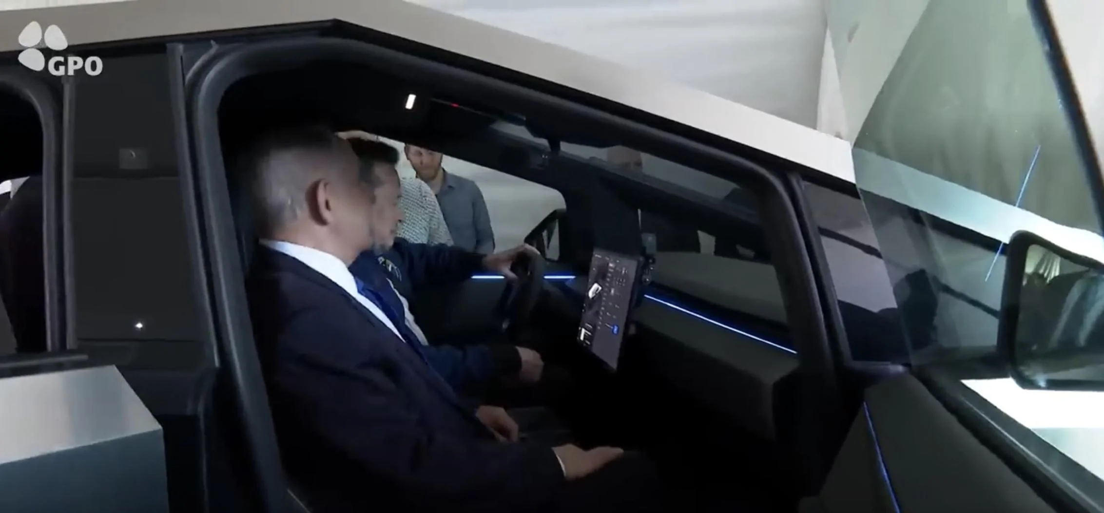 Tesla Cybertruck Cybertruck with LED light bar and in high suspension mode spotted at charging station 28719296-2A94-404C-9939-3AB1362CD00E