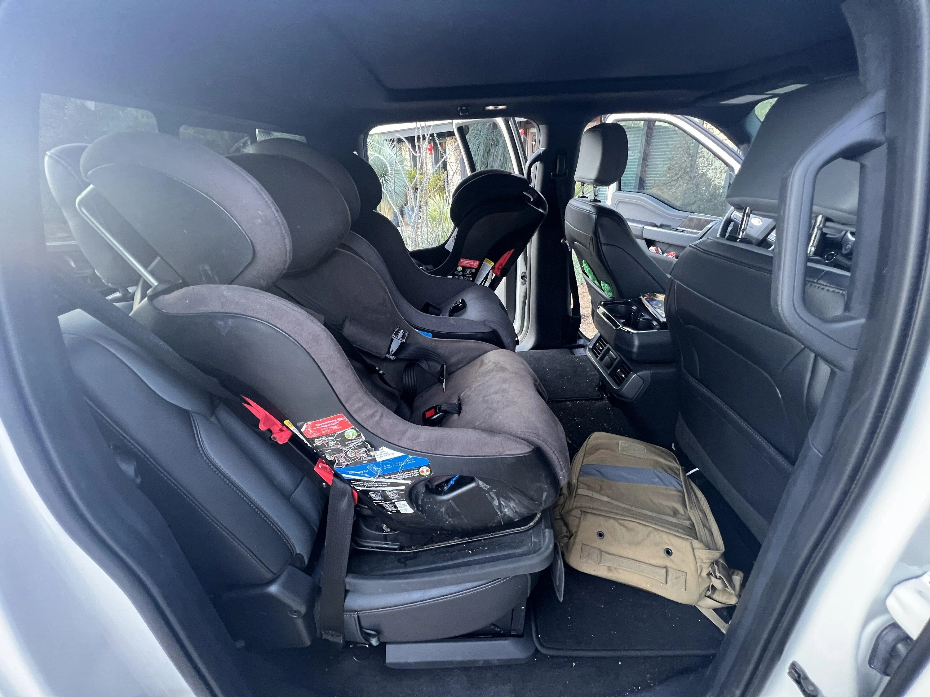 Tesla Cybertruck Storage boxes accessory below 2nd row seat when folded up FDBA56CB-6C51-419B-8127-2E9602D764F4