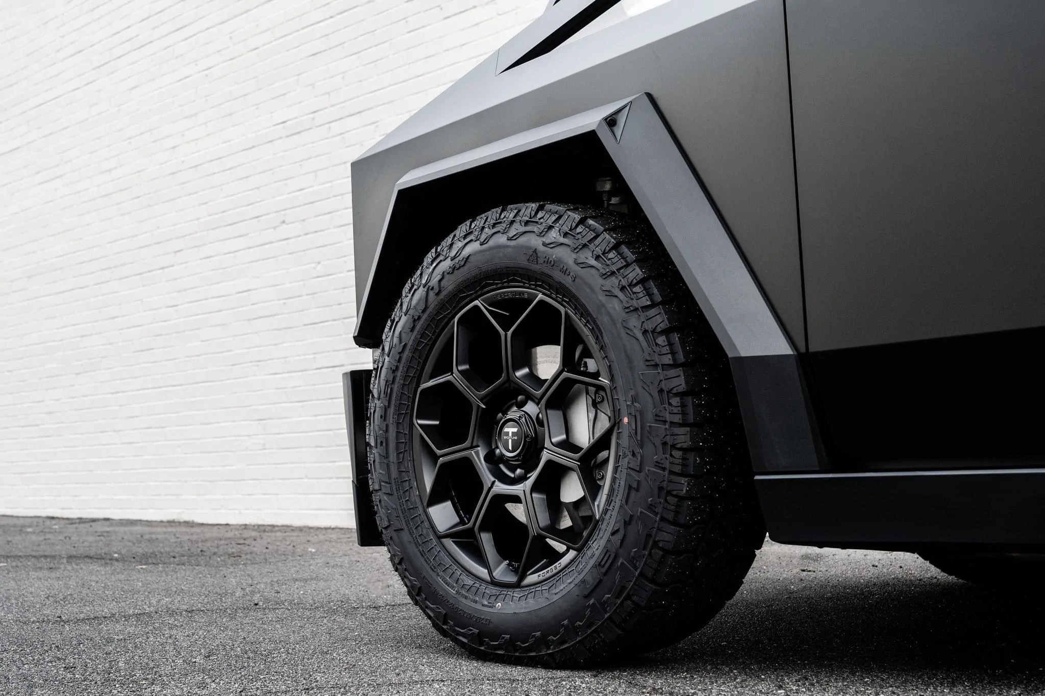 Tesla Cybertruck First Cybertruck on Aftermarket Wheels (T Sportline) + Falken Wildpeak AT Tires! Modified Foundation Series Cybertruck Black aftermarket wheels on matte black Cybertruck foundation series 1