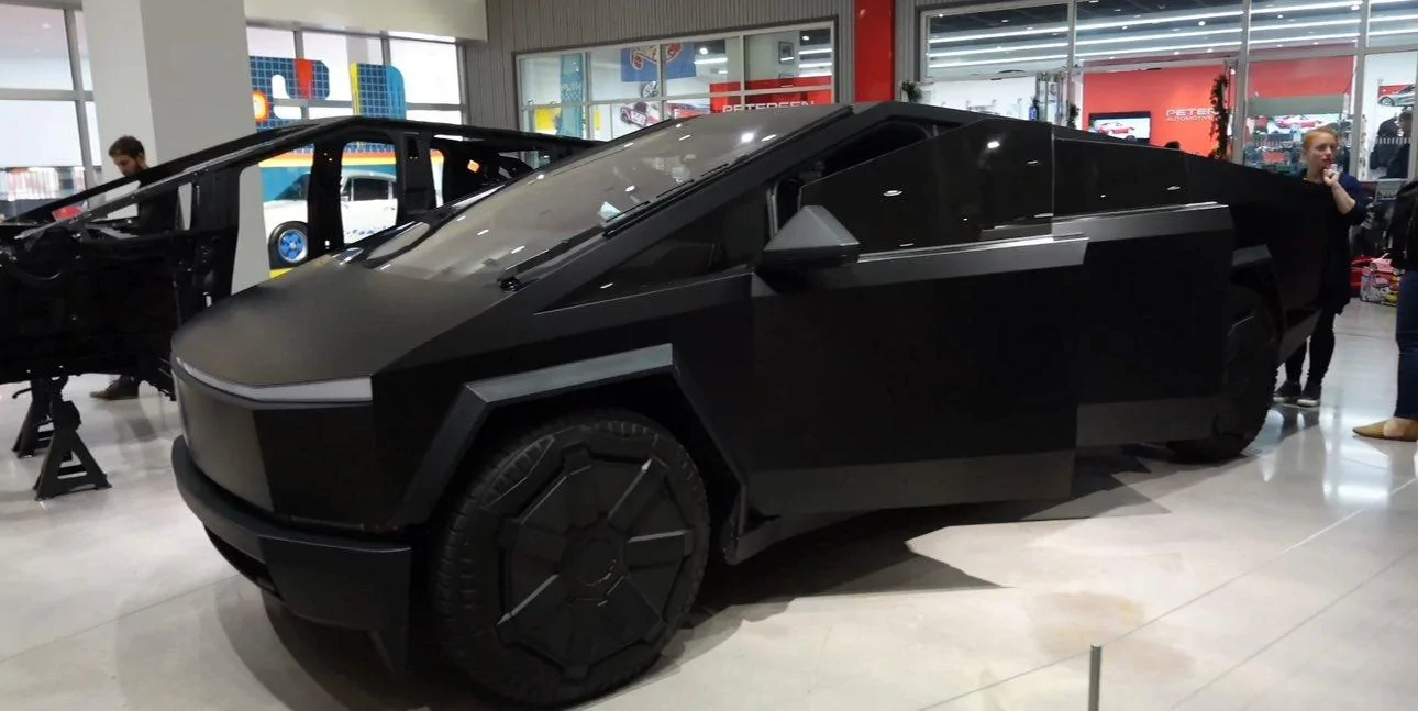 Tesla Cybertruck Petersen now has 2 Cybertrucks -- Bullet Tested + Franz's Black Cybertruck (w/ white interior) GB0TtpSWcAAxCvq