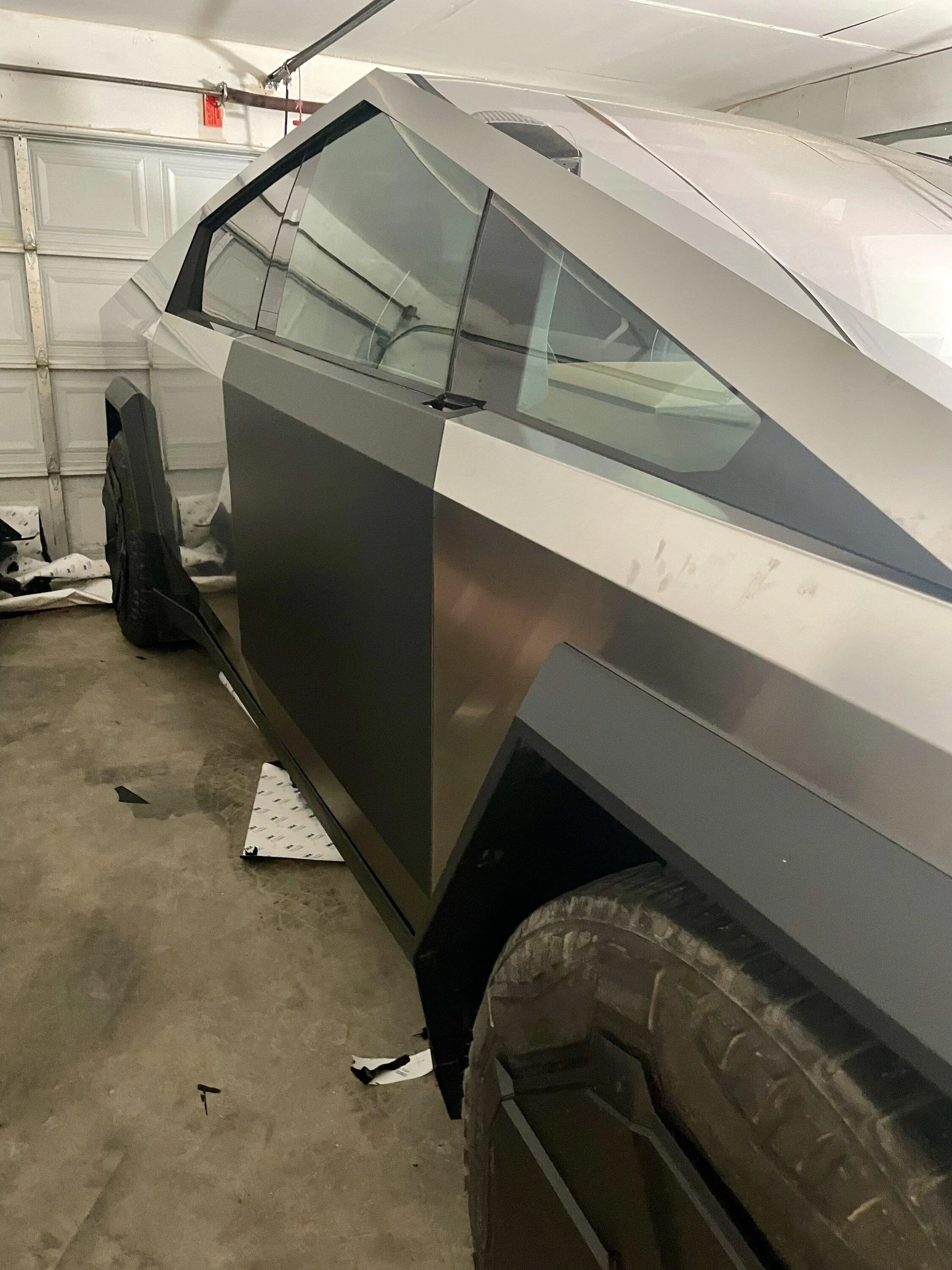 Tesla Cybertruck Here's the hole left after side mirrors are removed 📸 GB1WoK4XQAAJ_lG