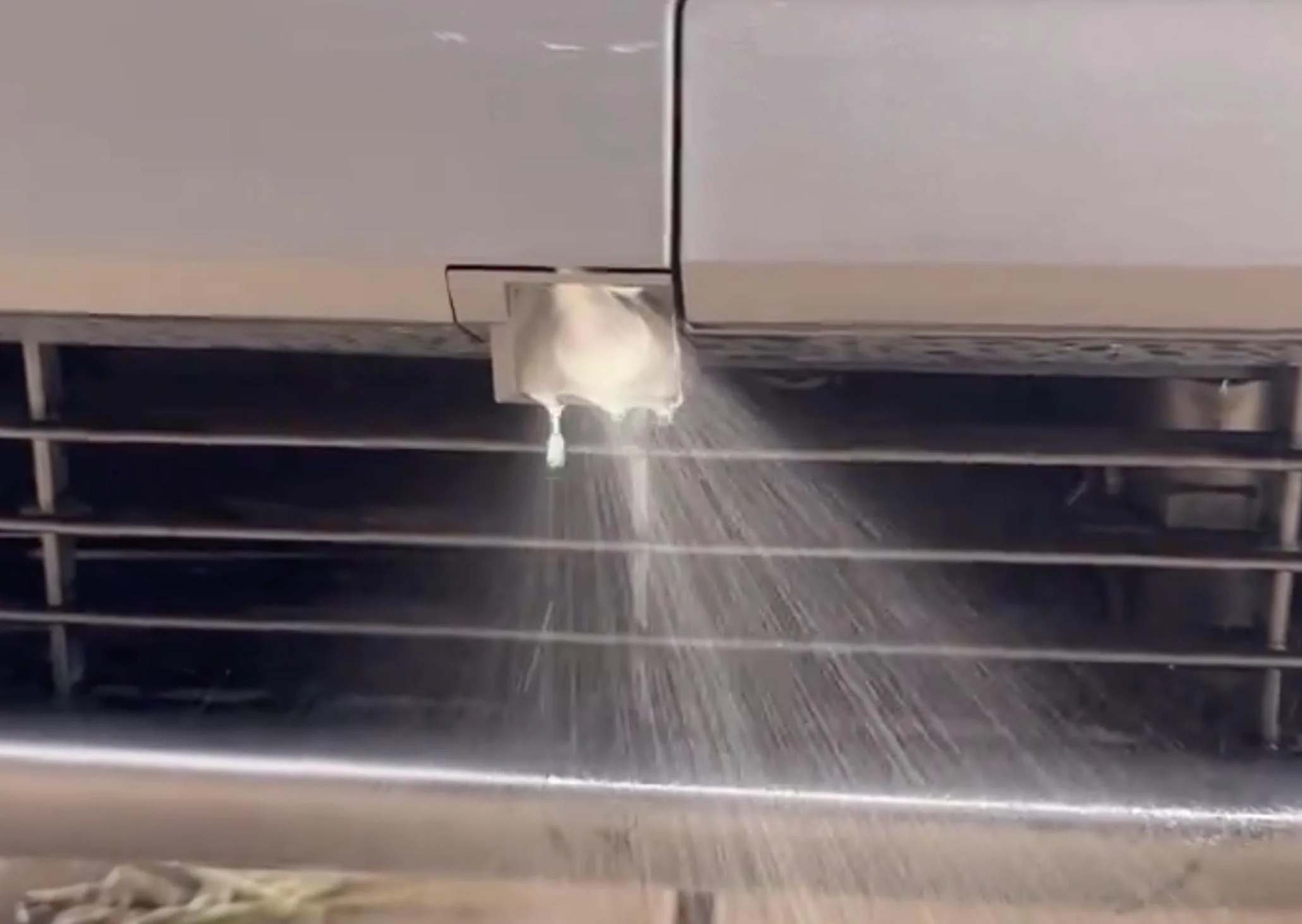 Tesla Cybertruck Front camera washer in action 💦 (from exterior and on display screen) Screenshot 2023-12-22 at 9.13.07 AM