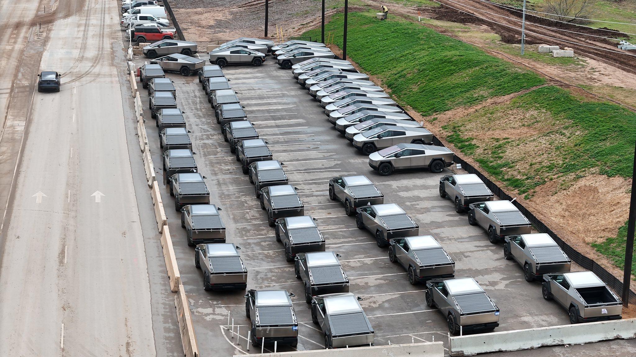 Tesla Cybertruck 85+ Cybertrucks spotted today 12/22 at Giga factory GB-XlmwbMAAcdlV