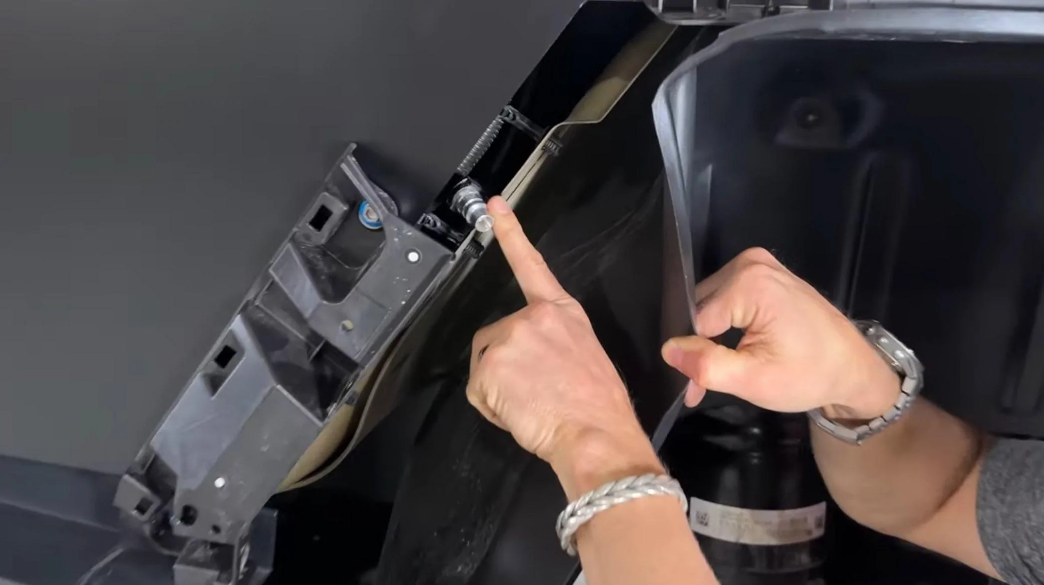 Tesla Cybertruck Air suspension has hidden air outlet to manually raise/lower suspension in case of failure cybertruck air suspension outlet