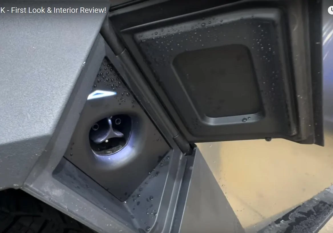 Tesla Cybertruck Water getting inside the charge port! Tesla - Cybertruck - charge port inside door is wet