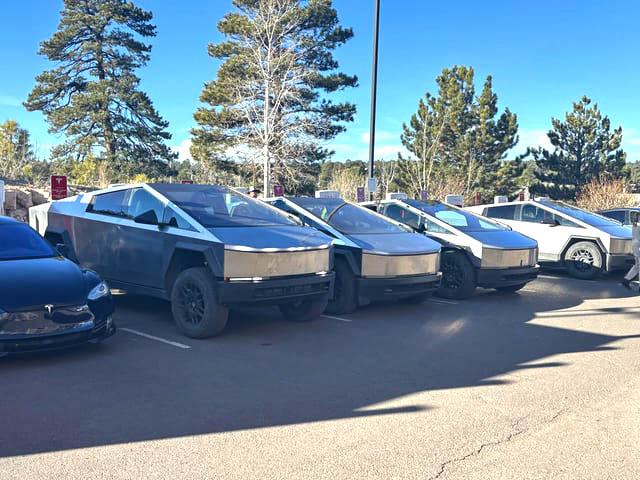 Tesla Cybertruck HIGH Suspension vs. LOW Suspension (Entry) Mode - side by side comparison photo cybertruck high suspension vs entry low suspension mode