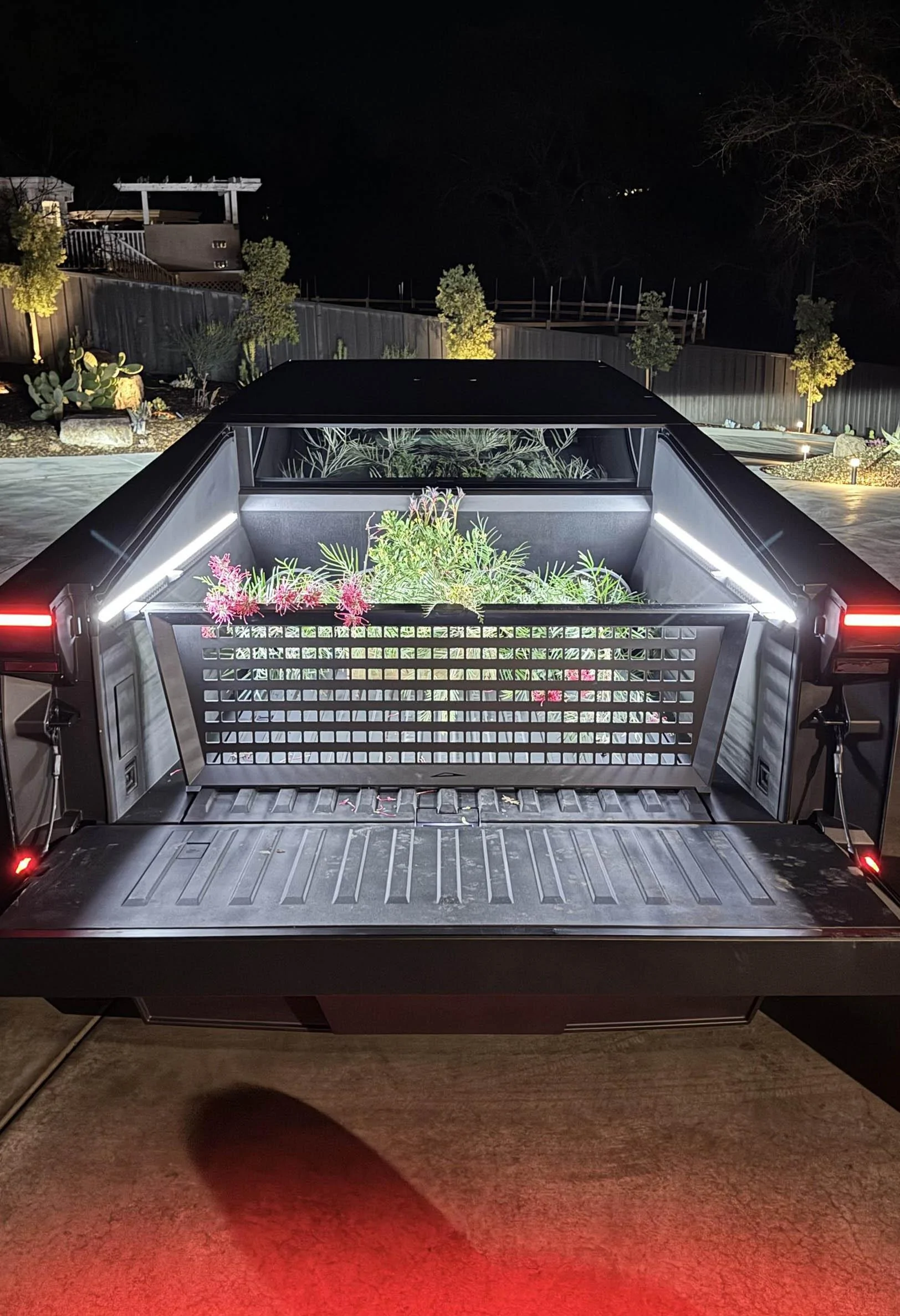 Tesla Cybertruck Molle Bed Divider + Bed Lights put to use at night cybertruck molle divider bed lights2 (1)