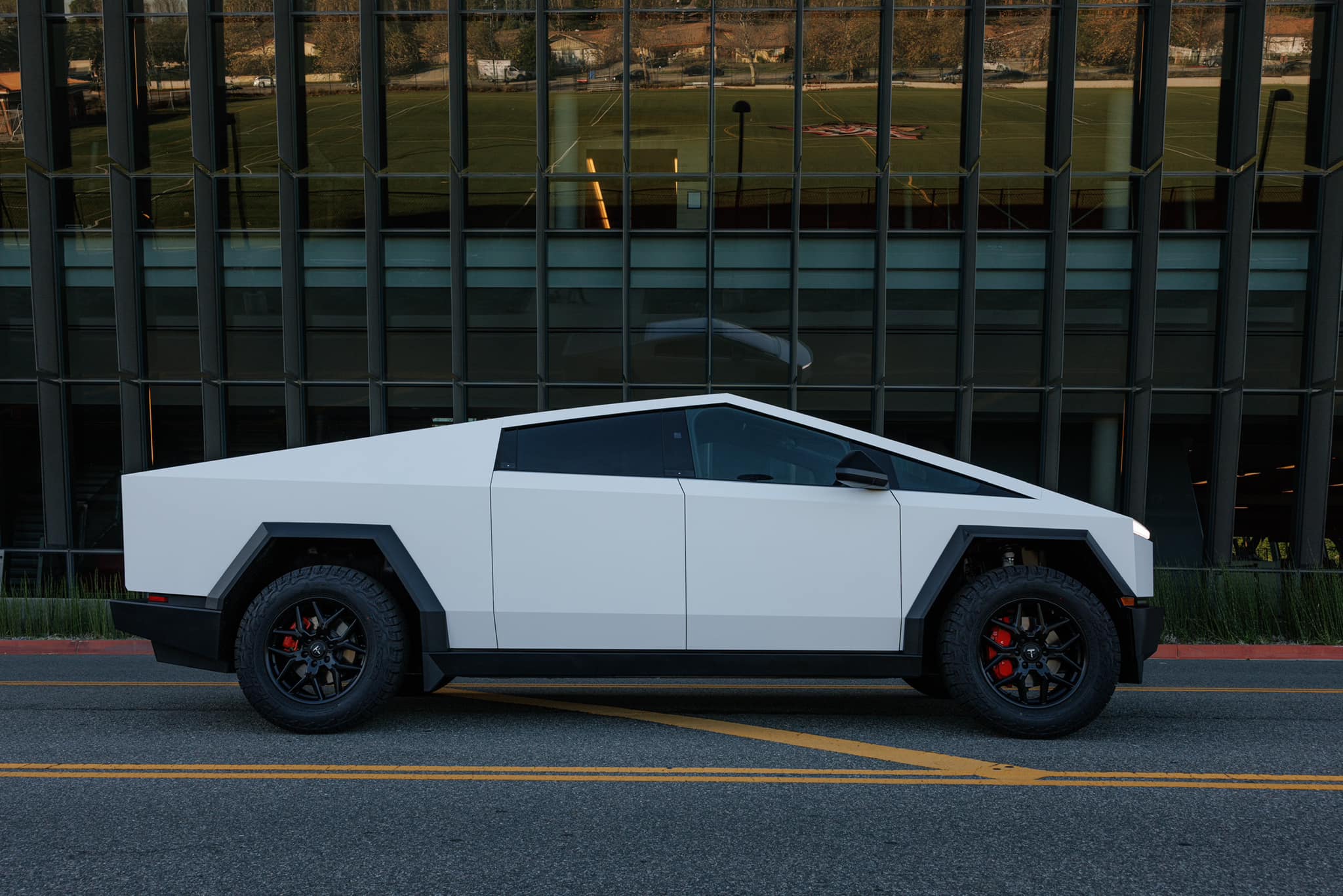 Tesla Cybertruck Satin White Cybertruck Wrap! With Aftermarket 20" TCT Flow Forged Wheels + Falken Wildpeak AT4/W Tires satin-white-wrap-cybertruck-1-