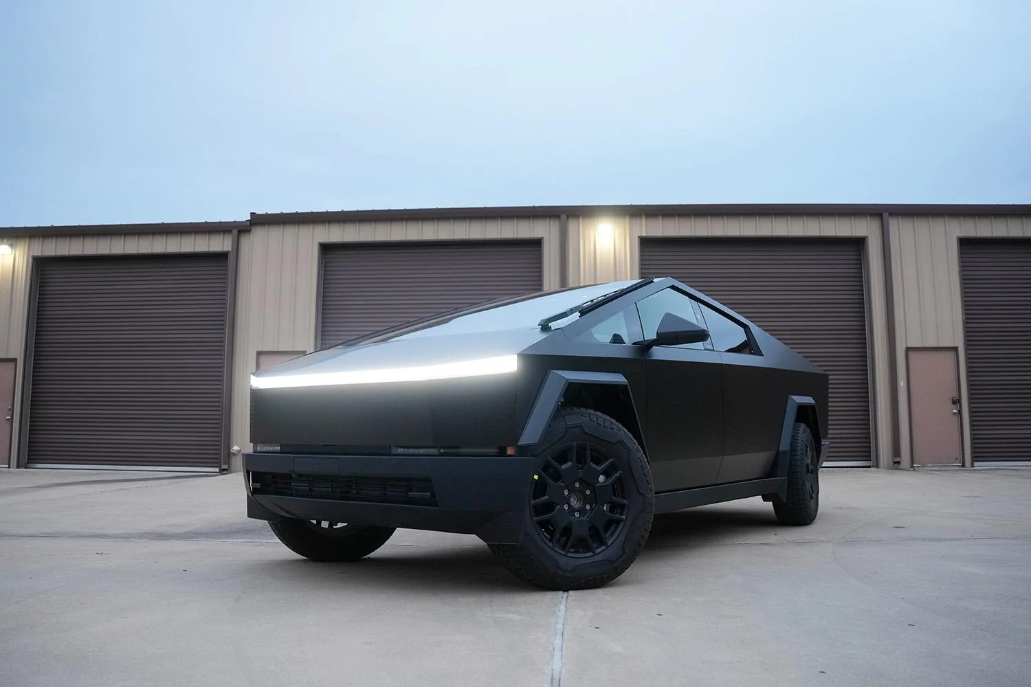 Tesla Cybertruck Cybertruck in 3M Satin Gold Dust Black wrap Cybertruck 3M Satin Gold Dust Black 4