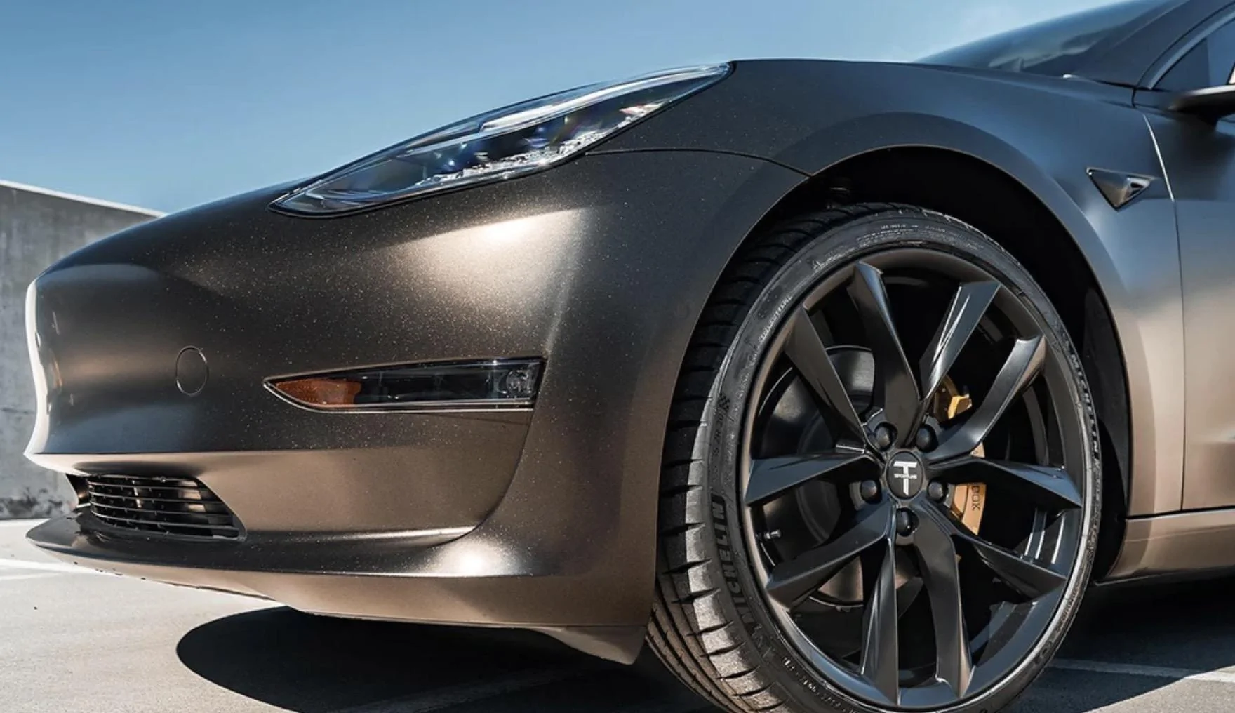 Tesla Cybertruck Cybertruck in 3M Satin Gold Dust Black wrap Screenshot 2024-01-09 at 5.48.17 AM