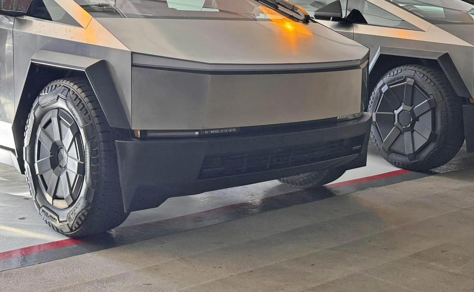 Tesla Cybertruck Small Aero Wheel Covers spotted & compared (to larger covers)! Cybertruck small smaller wheel caps covers 1