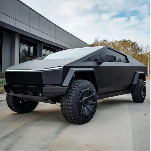 Tesla Cybertruck Black Cybertruck with big mudder tires (rendering) GENDCxqa0AEjqZ3