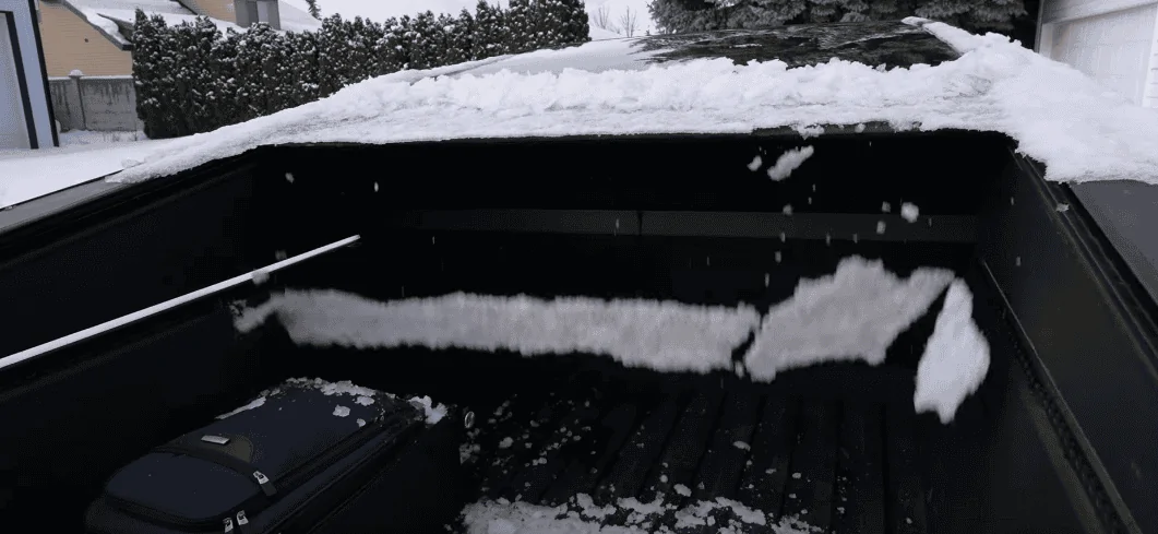 Tesla Cybertruck Owner: tonneau bed cover is pretty water resistant and my consumption is 468 Wh/mi so far zimage7291