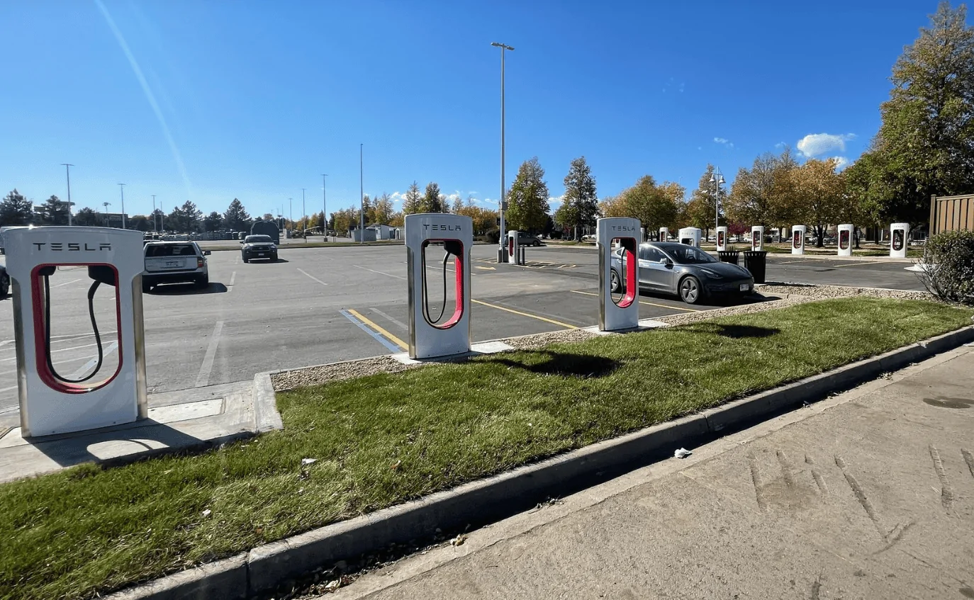 Tesla Cybertruck Spotted: EV Truck Towing Supercharger (Magic dock for all trucks too) --  Northglenn, CO charging station 1706062214913