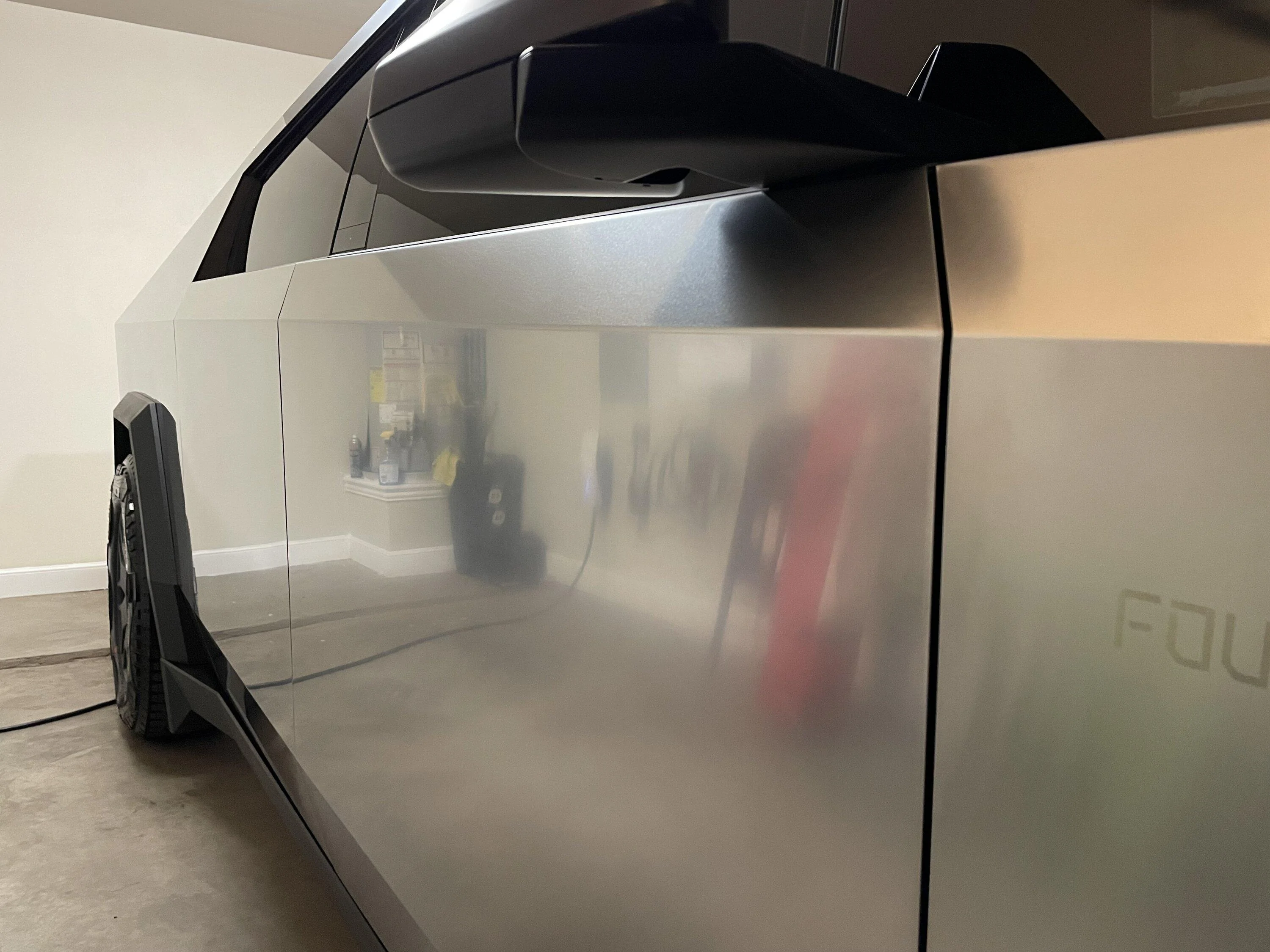 Tesla Cybertruck Bar Keepers Friend steel cleaner applied -- result photos IMG_3718