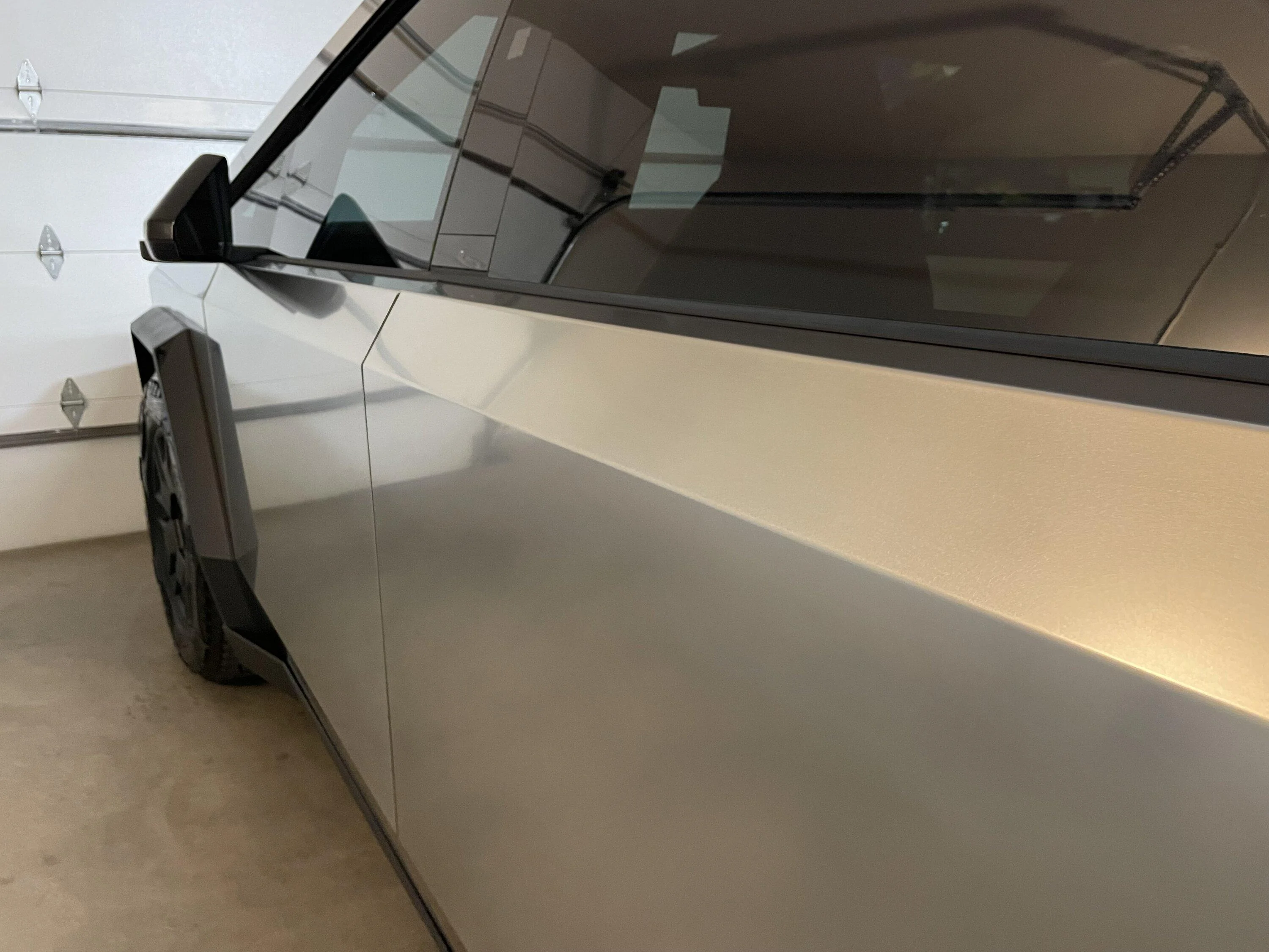 Tesla Cybertruck Bar Keepers Friend steel cleaner applied -- result photos IMG_3713