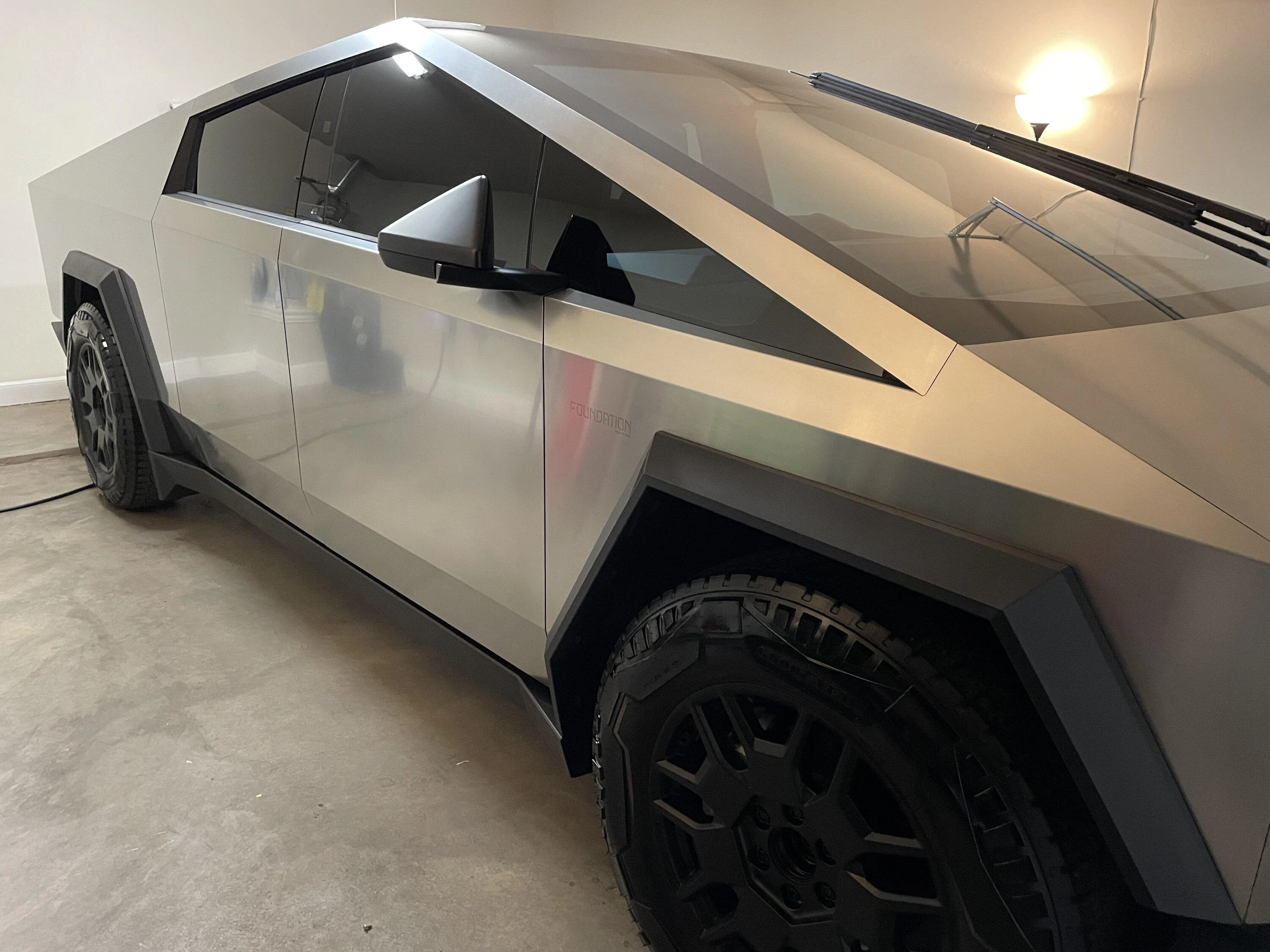 Tesla Cybertruck Bar Keepers Friend steel cleaner applied -- result photos IMG_3716