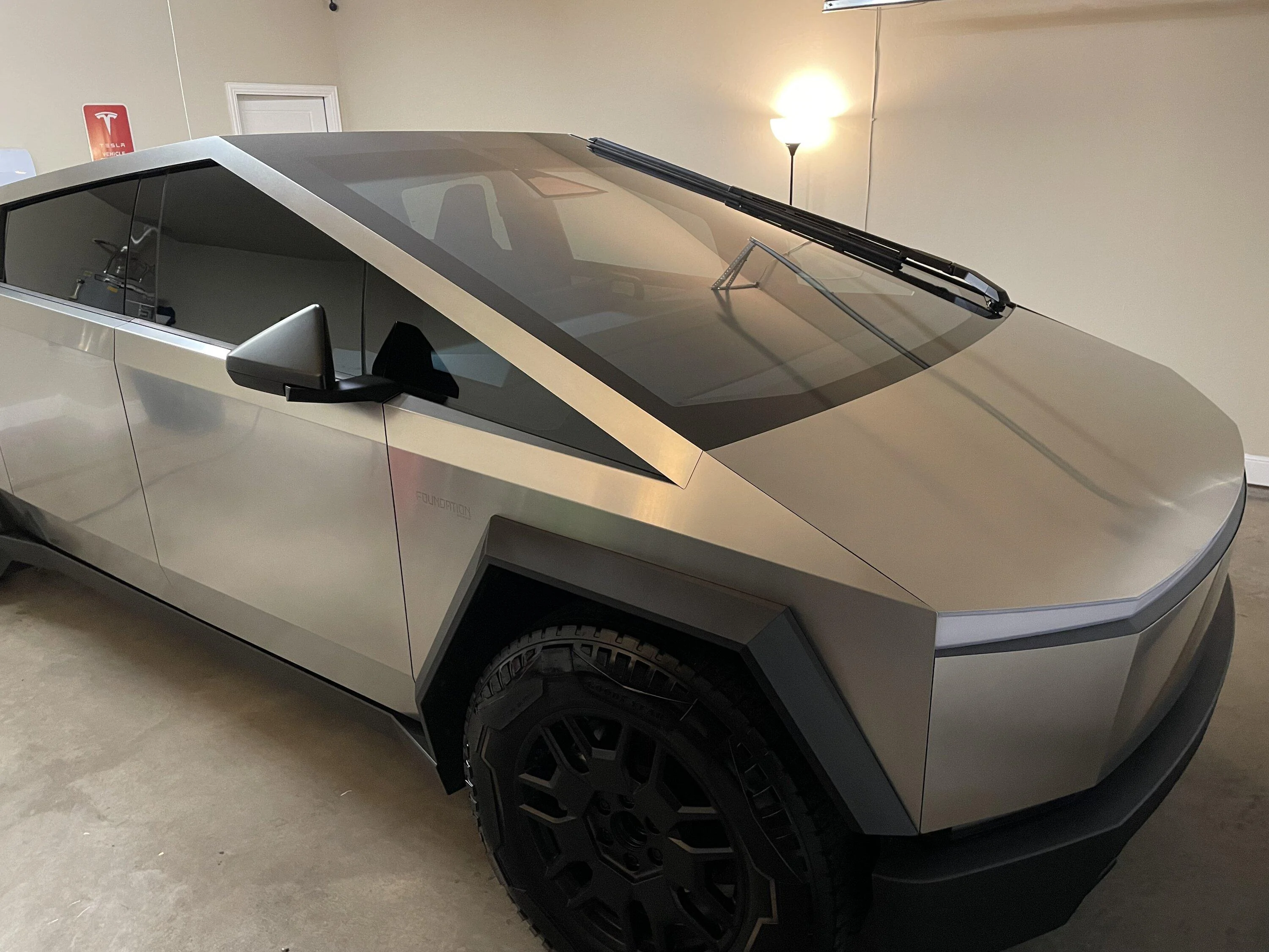 Tesla Cybertruck Bar Keepers Friend steel cleaner applied -- result photos IMG_3715