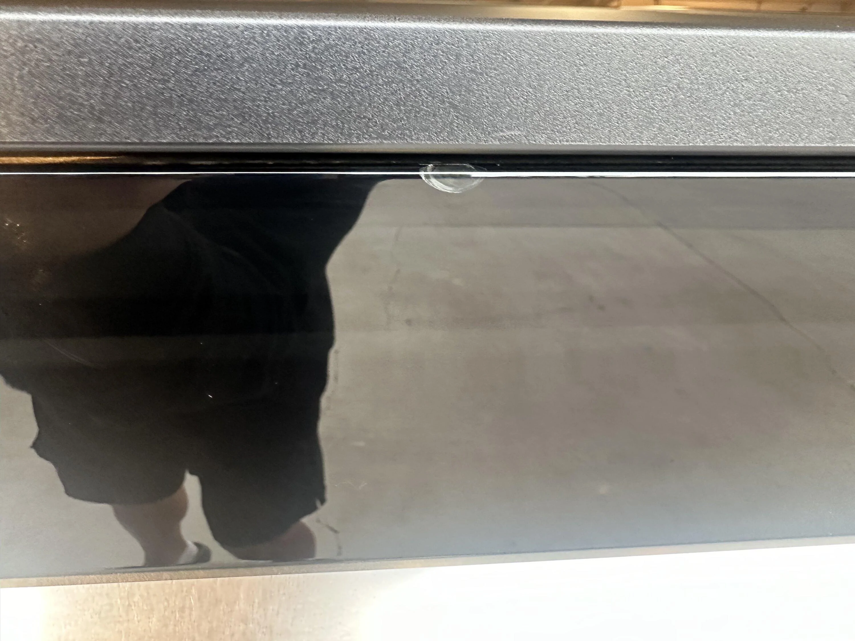 Tesla Cybertruck First service appointment completed: tailgate lightbar cracked glass & stained running boards IMG_5394