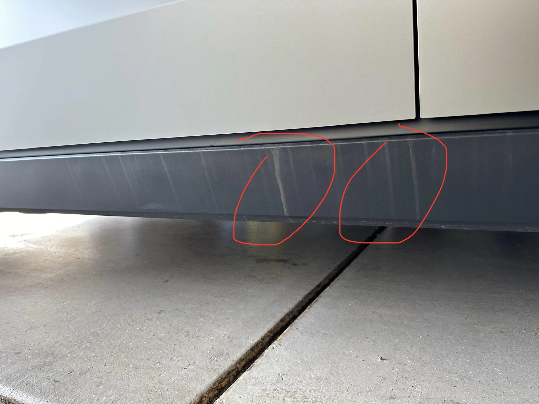 Tesla Cybertruck First service appointment completed: tailgate lightbar cracked glass & stained running boards IMG_5251