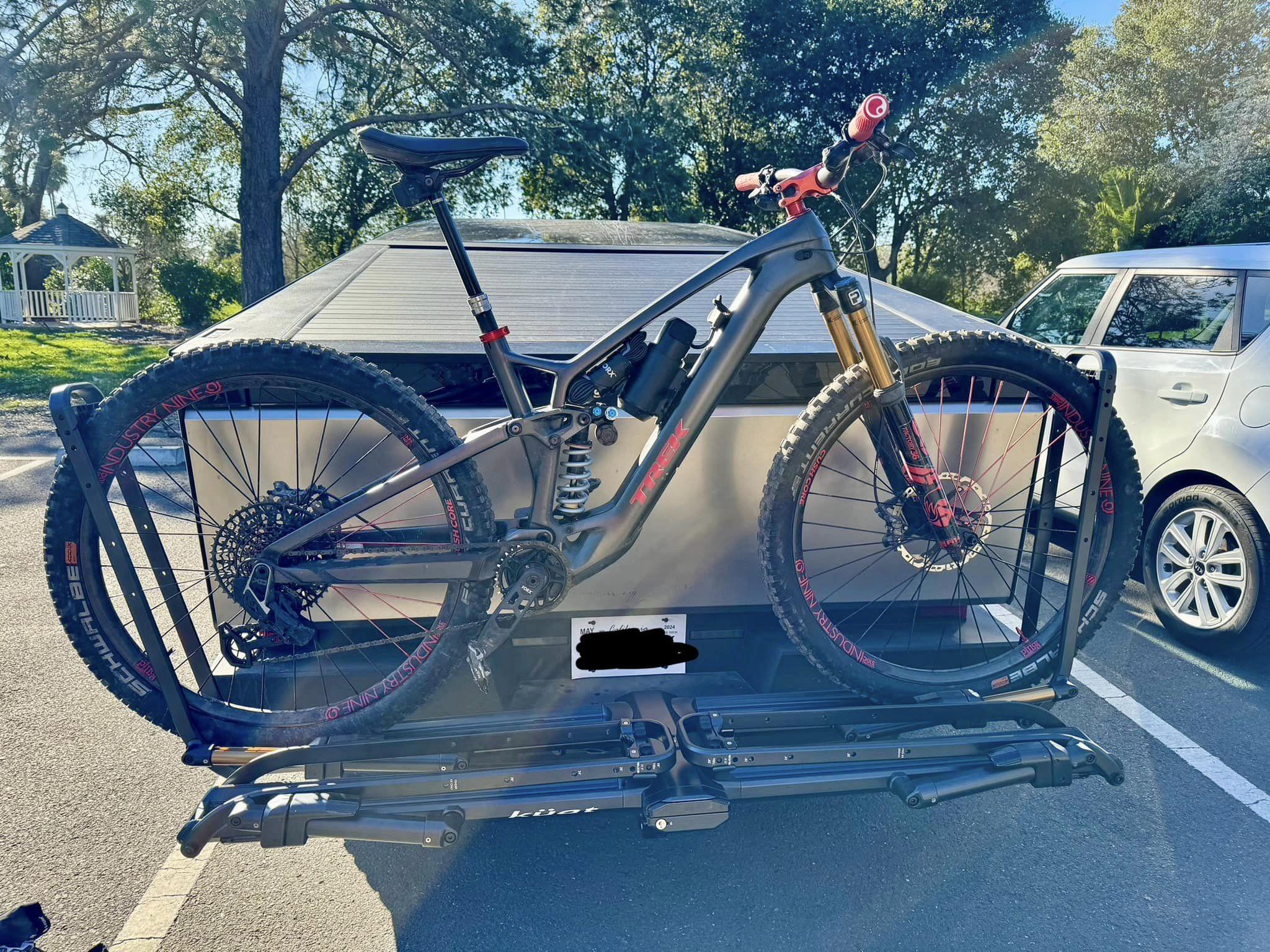 Tesla Cybertruck Kuat Bike Hitch Rack installed photos + mountain bike fully fit laying down in bed Cybertruck bike hitch rack Kuat 4