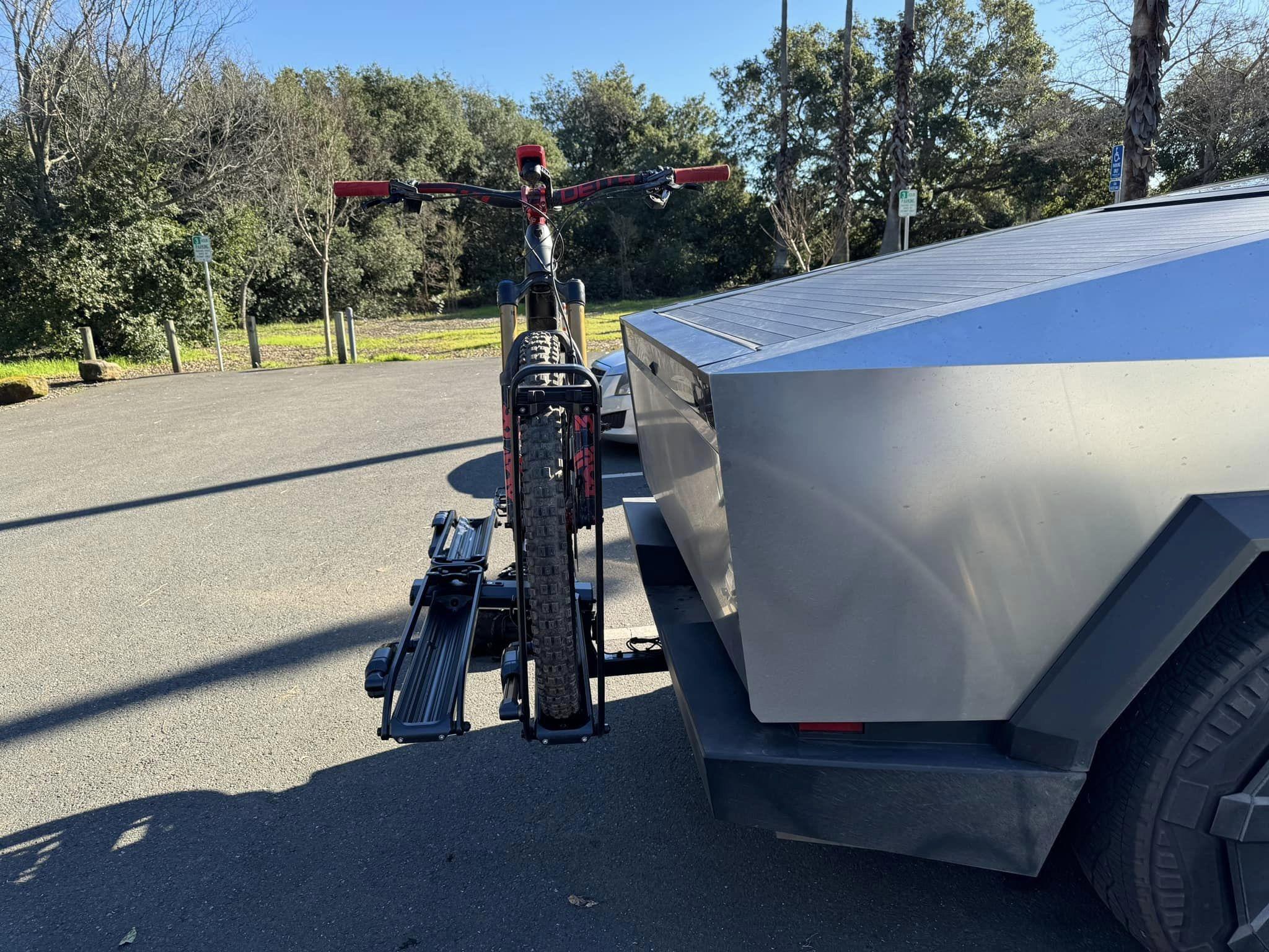 Tesla Cybertruck Kuat Bike Hitch Rack installed photos + mountain bike fully fit laying down in bed Cybertruck bike hitch rack Kuat 3