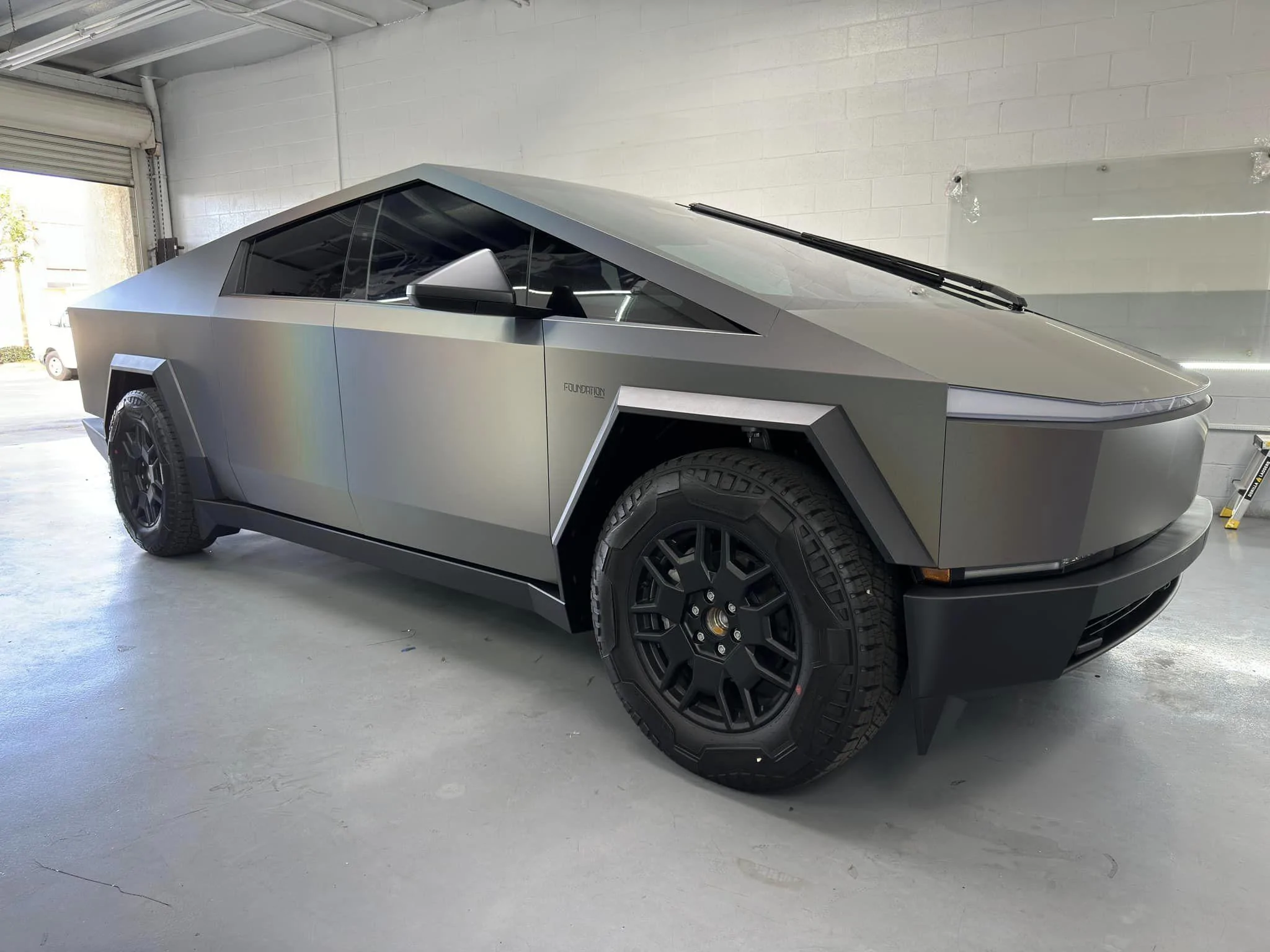 Tesla Cybertruck 3M 2080 Satin Flip Psychedelic Vinyl Wrap on Tesla Cybertruck Looks Amazing 3M 2080 Satin Flip Psychedelic Vinyl Wrap Cybertruck 1