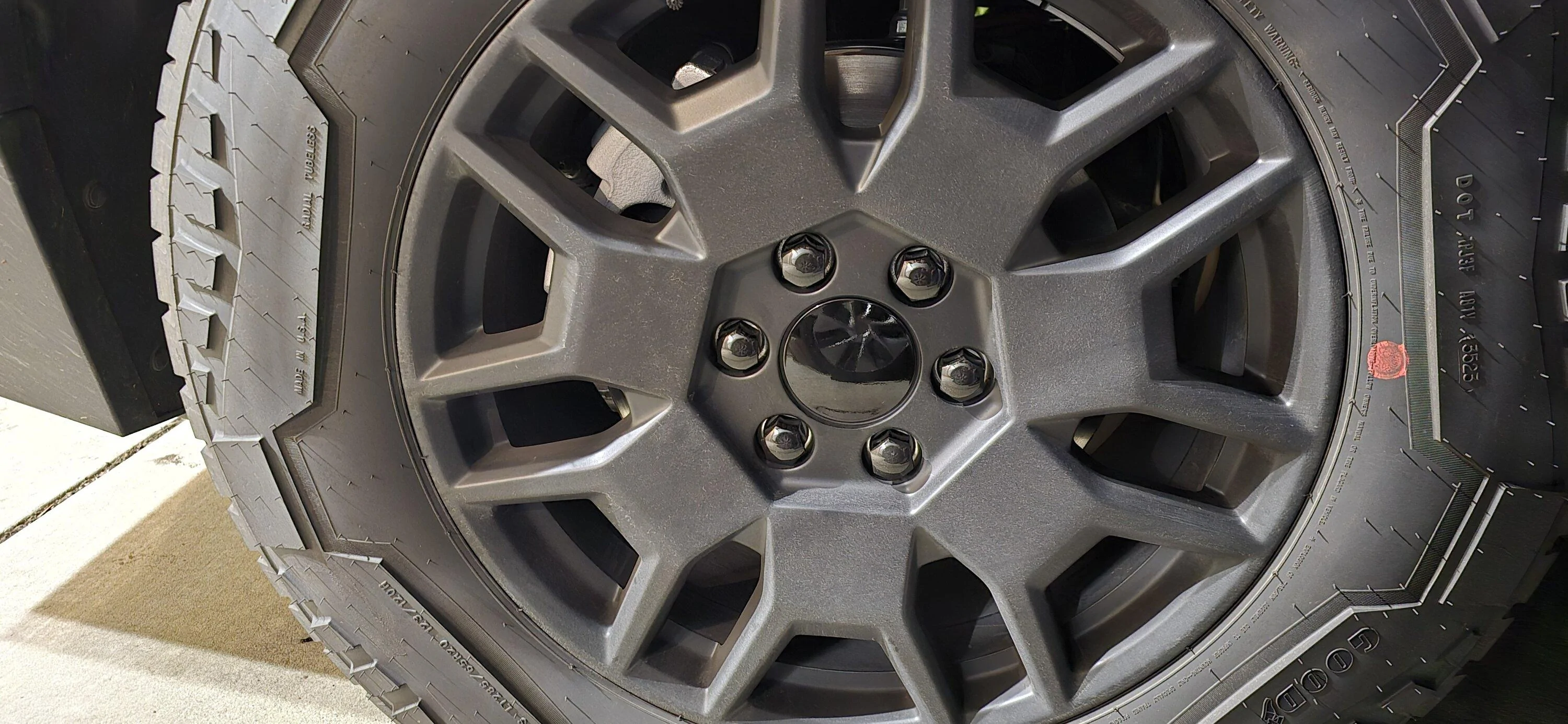 Tesla Cybertruck Center caps from Amazon fit well 20240215_195506