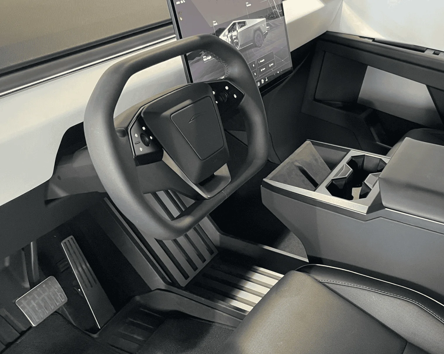 Tesla Cybertruck what is the purpose of those stripes (grooves?) in the rubber (?) at the bottom of the center console? Screenshot 2024-02-20 at 9.39.59 PM