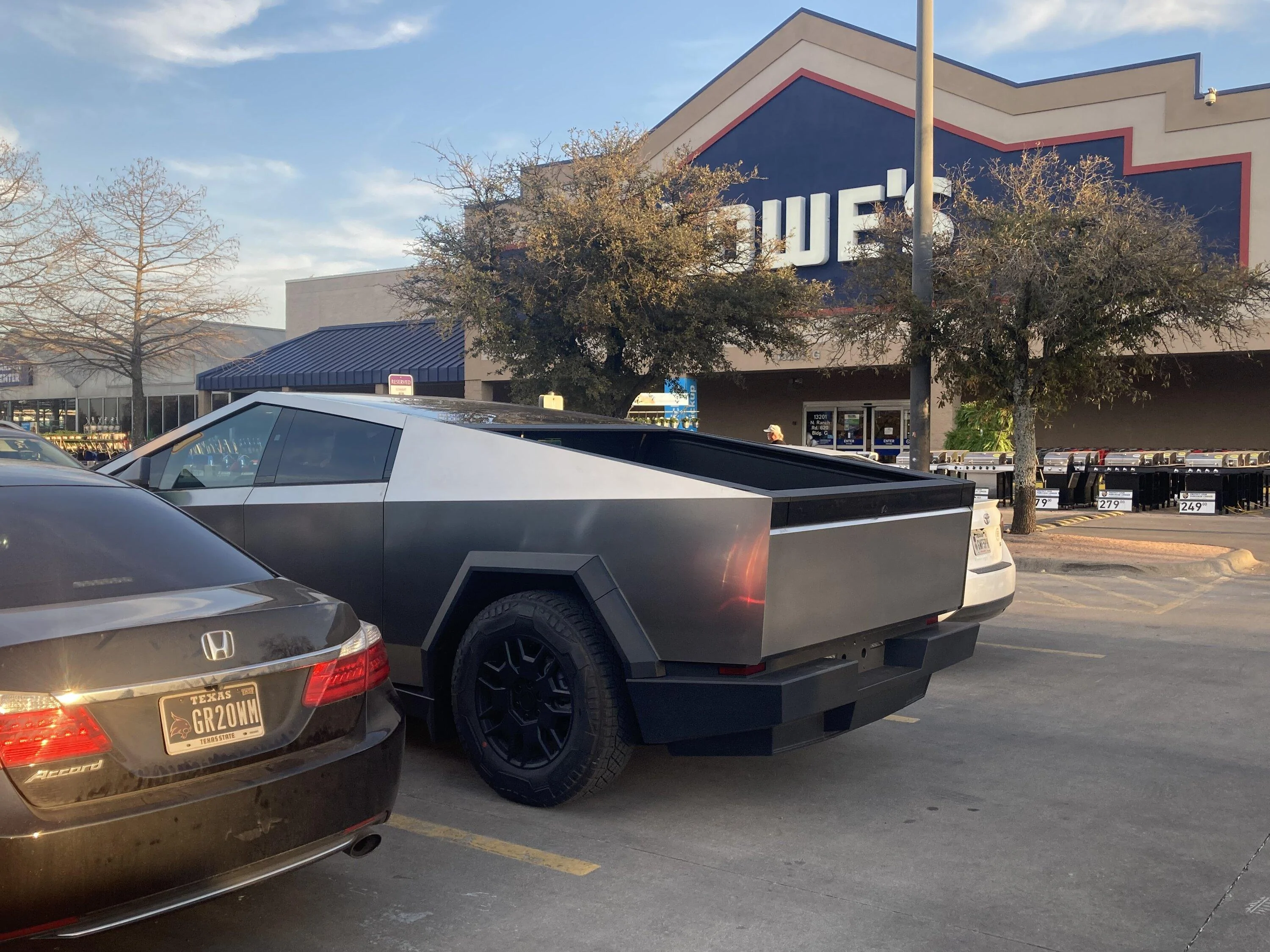Tesla Cybertruck Who here is at Lowe’s in Austin right now? 🤔 IMG_2910
