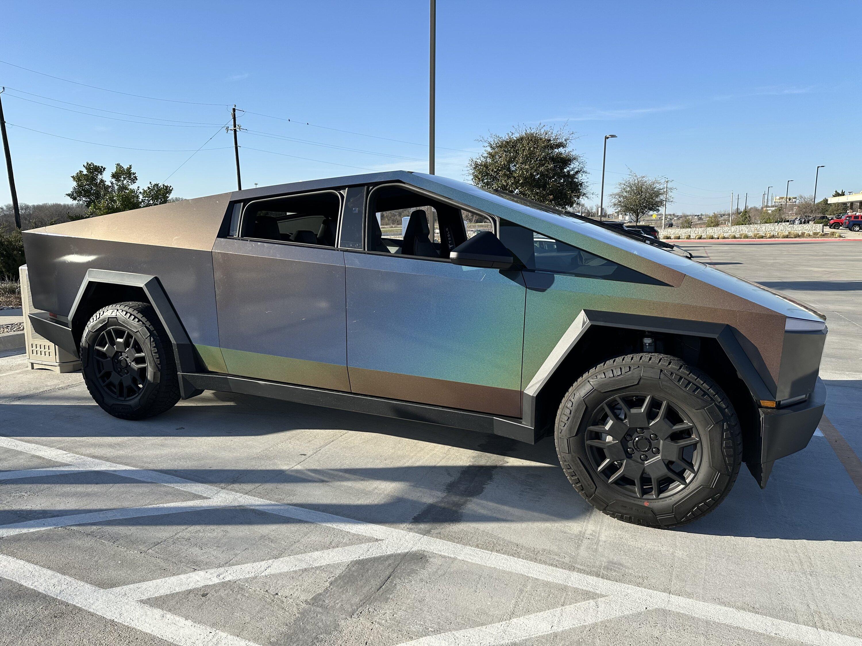 Tesla Cybertruck Another wrap…. 3M 2080 series Satin Psychedelic on my Cybertruck IMG_4658