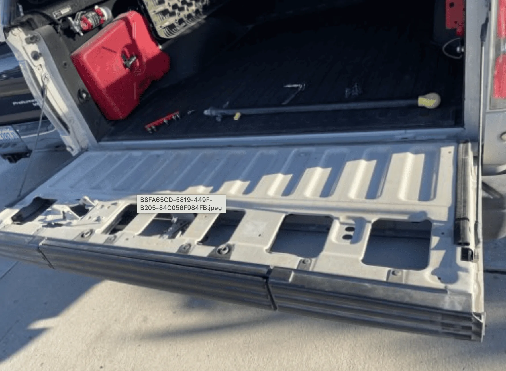 Tesla Cybertruck Removing everything plastic from a Cybertruck: Hidden tailgate accessory space? 1709276050263